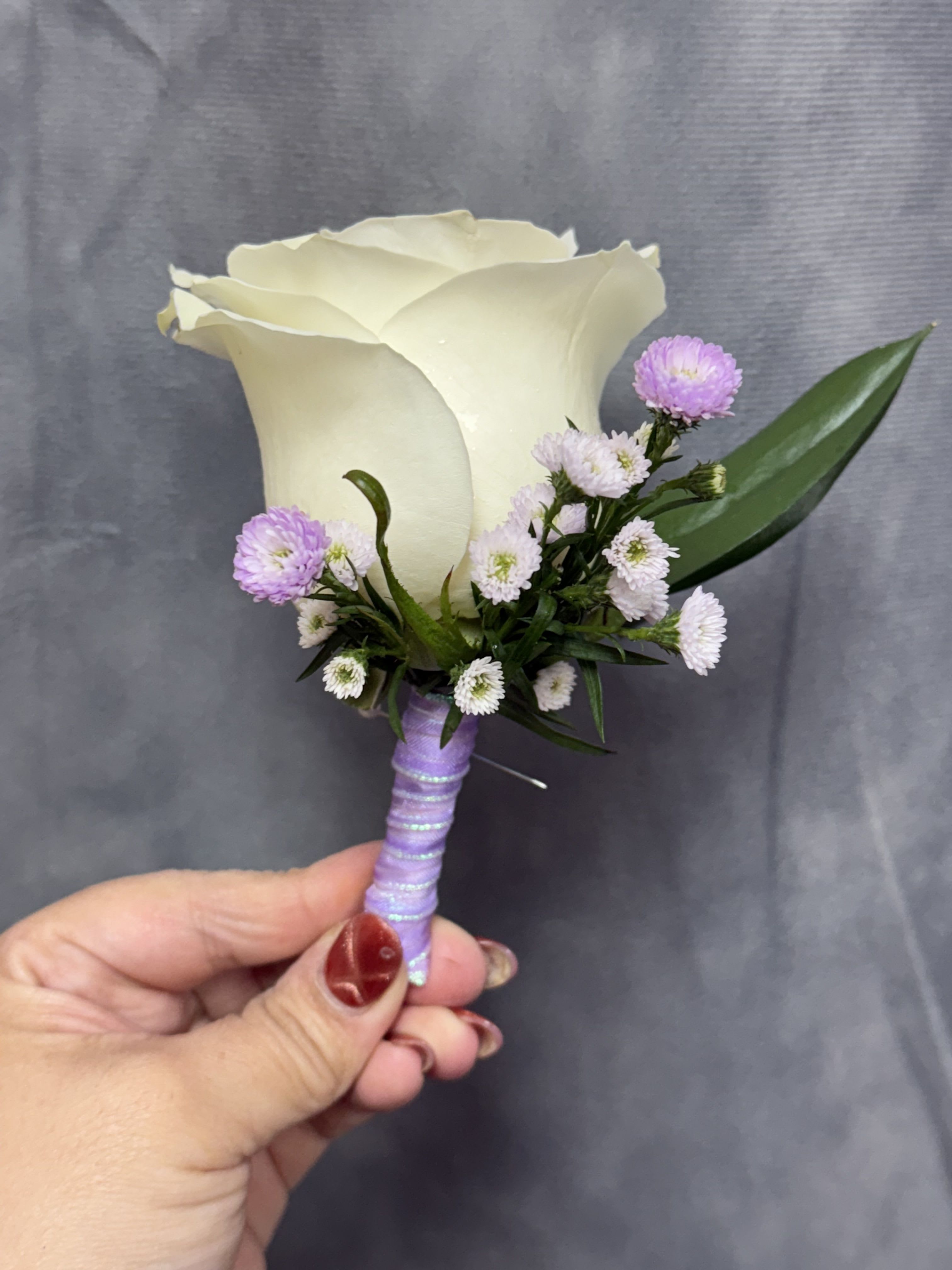 White rose lavender boutonnière  - White rose  boutonnière with lavender and white accents, wrapped in lavender ribbon 