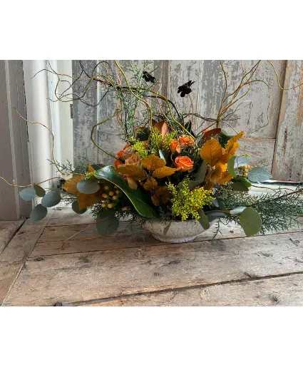 Vermont Thanksgiving - Seasonally colored roses, berries, and foliage are presented in a stoneware bowl Available in two sizes  Includes: Roses, Berries And Seasonal Foliage In A Stoneware Bowl.