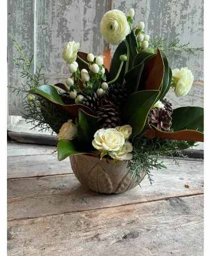 Farmhouse Thanksgiving - This centerpiece features roses, ranunculus, berries and seasonal foliage. Available in two sizes (Pictured in standard size)  Includes: Roses, Ranunculus, Berries, Foliage, Pinecones.