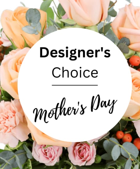 Peach and pink roses with eucalyptus around a Mother's Day label