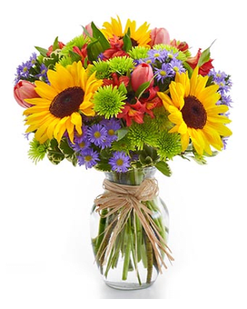 Colorful bouquet with sunflowers, purple daisies, and pink tulips in a glass vase