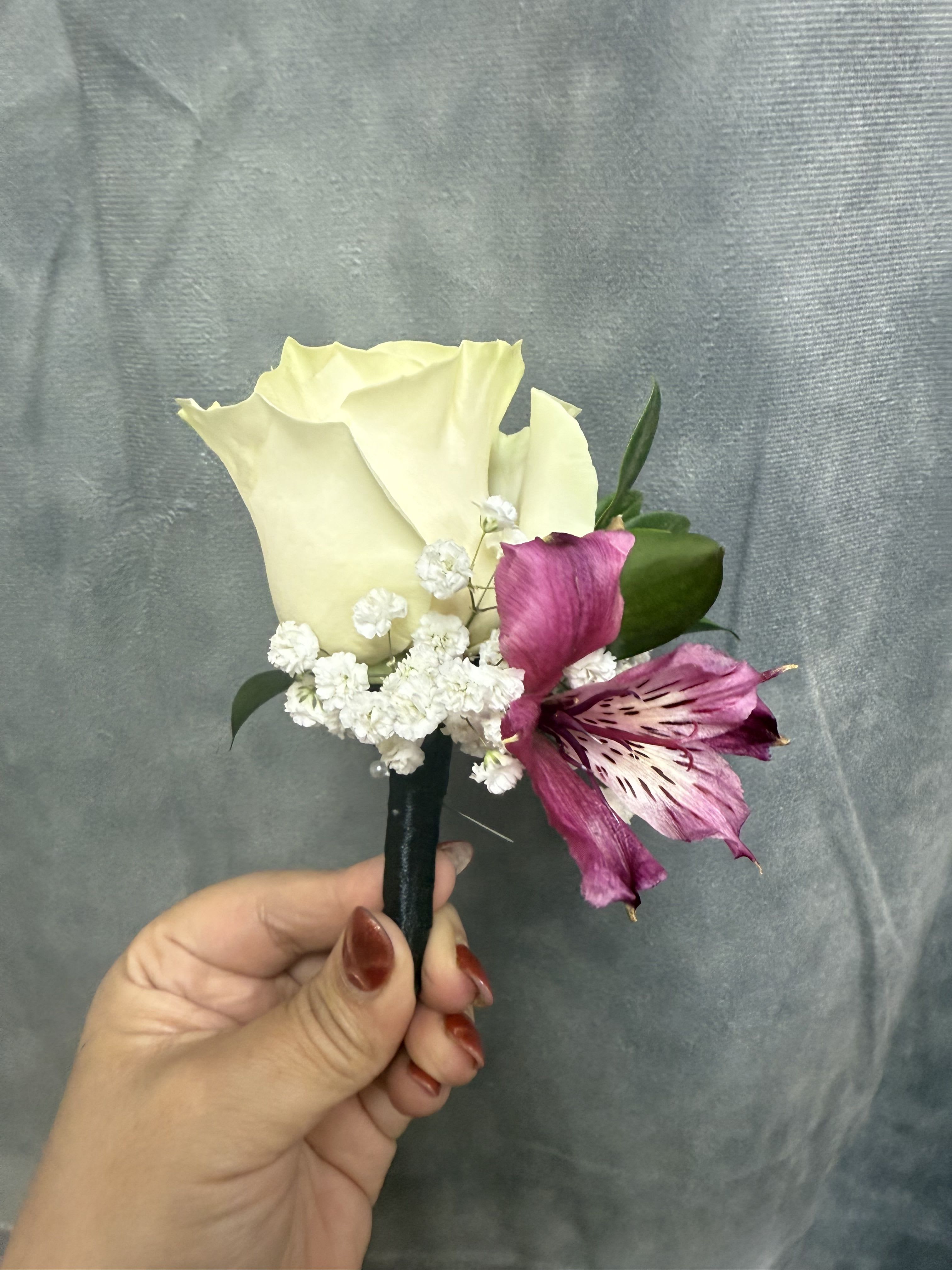 White rose plum boutonnière  - Creamy white rose with plum alstroemeria and delicate white fillers, wrapped in black ribbon