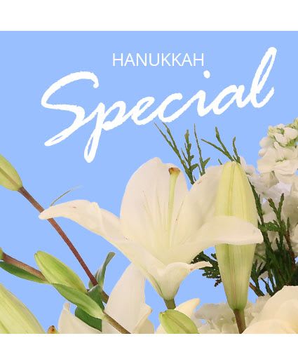 Hanukkah Special Designer's Choice - Bring life and happiness to any Hanukkah festivity with some beautiful flowers! Our designers will go above and beyond to create something special for your holiday celebrations. Order our Hanukkah Special and add some bright and dazzling flowers to your home today!