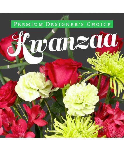 Premium Kwanzaa Florals Designer's Choice - Add a stunning and natural touch to your Kwanzaa celebration with an expertly designed floral arrangement! Our designers will create something truly as wonderful and beautiful as this holiday celebration. Send our Premium Designer's Choice Kwanzaa arrangement to someone you love!