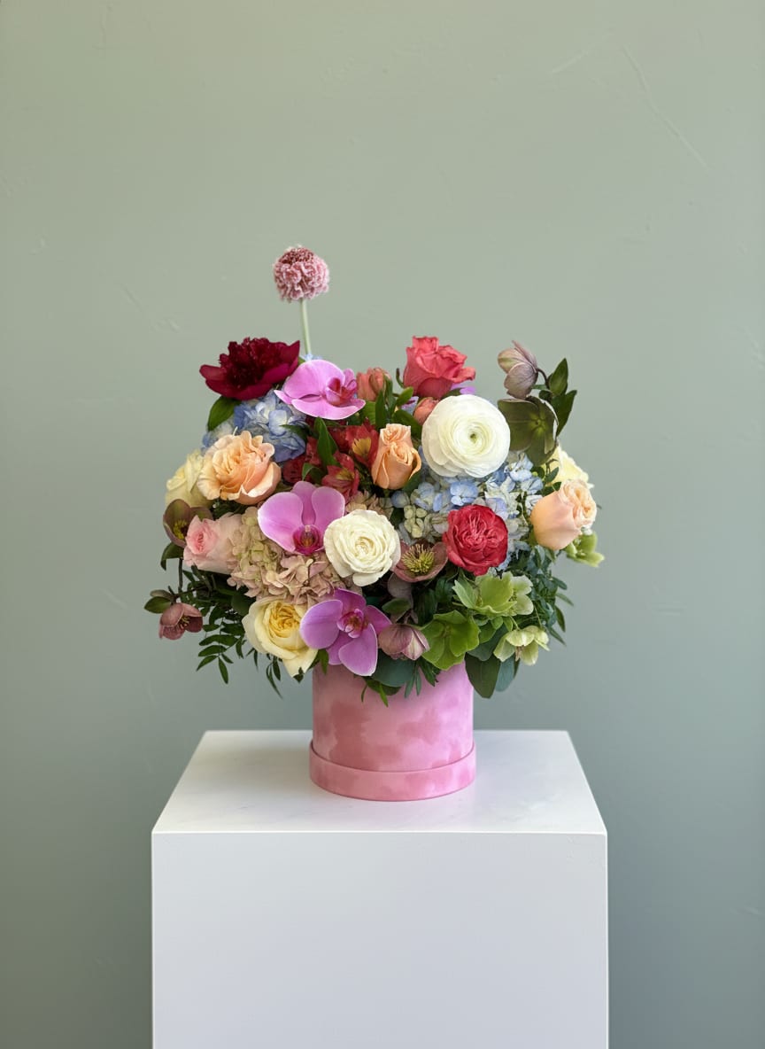 Grand Amour - A lush arrangement of pink and peach roses with fresh greenery, designed in an elegant silver bowl. Perfect for gifting or romantic night.