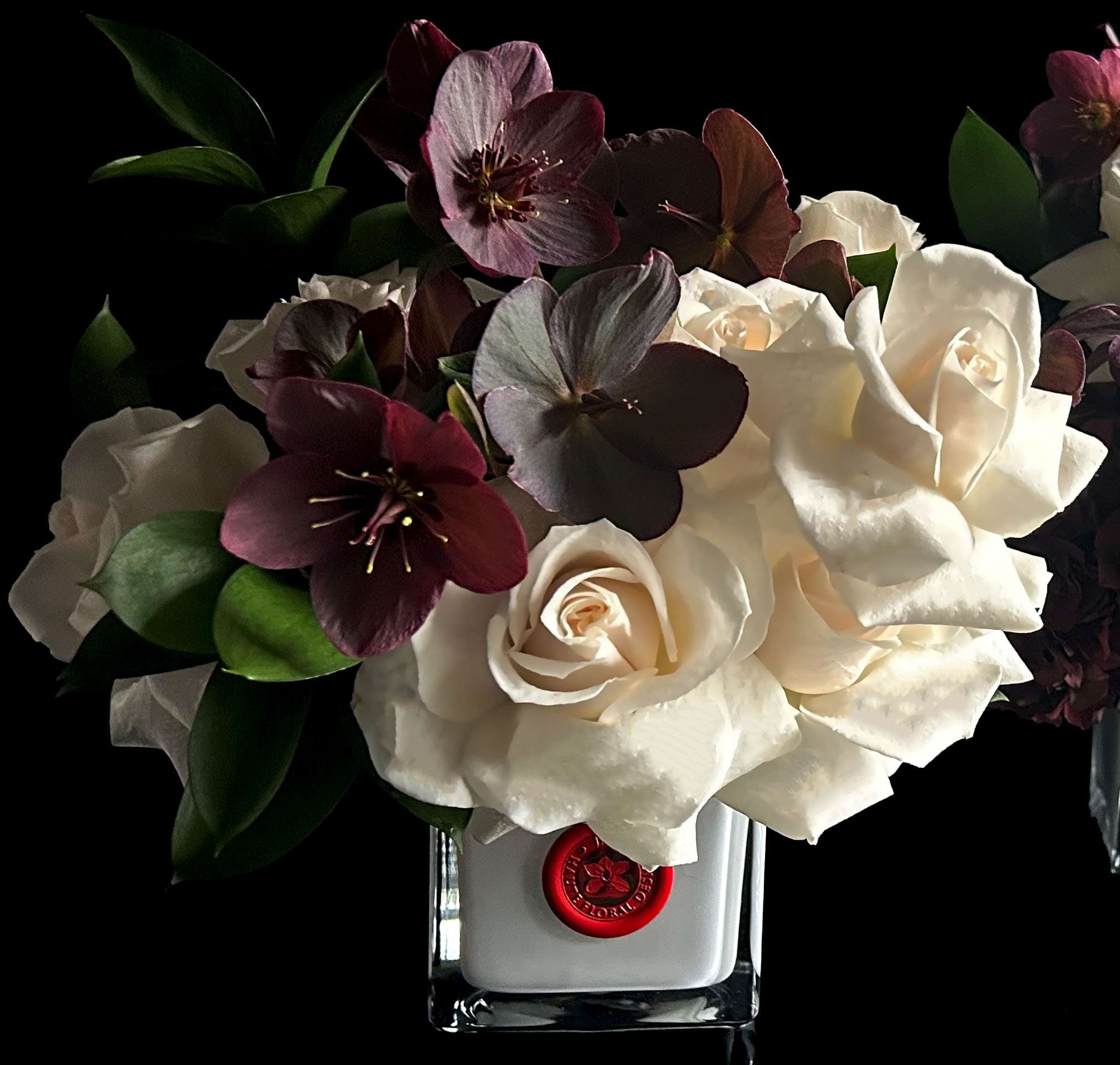 Roses and Hellebores - Roses and Hellebores in white glass vase.