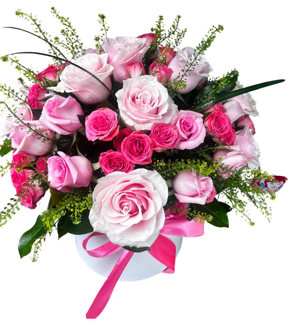La Bibi Bouquet - A lush cluster of pink and white roses arranged low and close in a round white hat box-this romantic bouquet makes a perfect birthday bouquet or anniversary roses gift that reads soft, feminine, and celebratory. The layered blooms create a full, pillow-like effect so the person you're thinking of will feel truly cherished the moment the lid comes off.  The arrangement includes roses in varying shades of pink and crisp white, set against glossy green foliage and fine filler sprigs for subtle texture. Presented in a white hat box and finished with a bright pink ribbon, it arrives ready to display on a bedside table or dining room centerpiece; compact and dense, it offers big visual impact in a neat, gift-ready size.