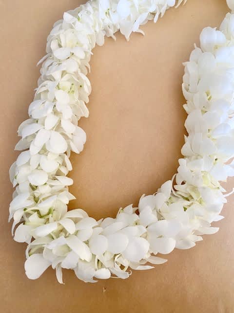 Orchid Lei - Double White - This is a beautiful handmade white orchid lei, with carefully selected blooms. Your choice of finishing ribbon color. Please specify in notes at checkout.