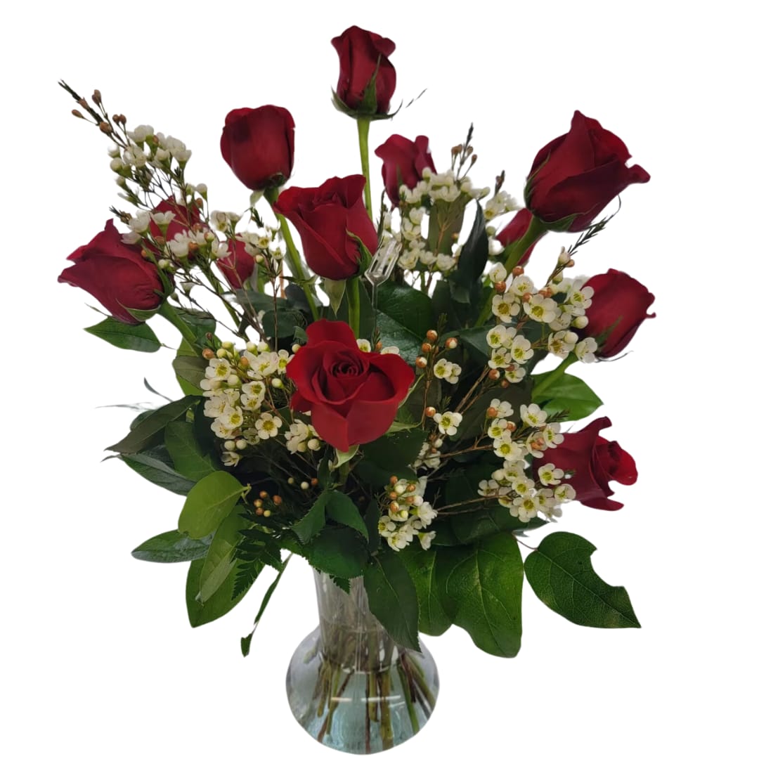 Premium Dozen - A dozen red roses are always perfect, always savored. We add even more charming beauty with wax flower, eucalyptus and salal.