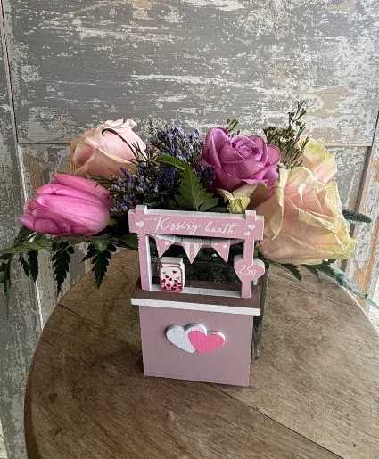 Kissing Booth - Pink Valentines Arrangement - Pink and purple tulips and roses arranged in a sweet "kissing both" attached to a clear glass cube vase