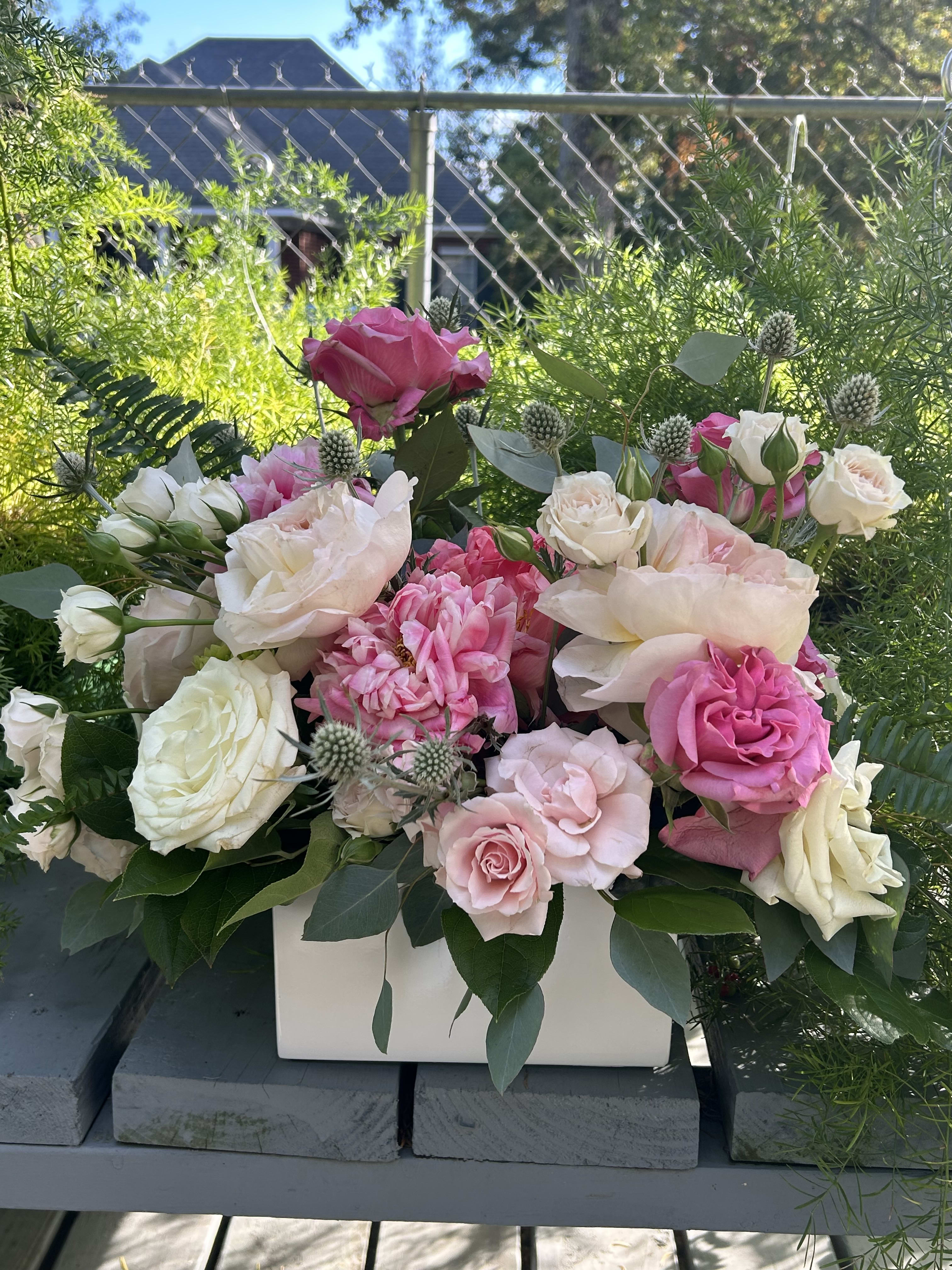 All Things PINK - Celebrate Elegance with All Things Pink Immerse yourself in a world of pink beauty with our "All Things Pink" arrangement, a stunning blend of beautiful shades designed to captivate and enchant. Perfect for the romantics and especially the debutante season, this exquisite bouquet makes a delightful gift that exudes charm and grace. **Featured Blooms:  ***Garden Roses and Peonies - Renowned for their lush petals and romantic allure. ***Spray Roses: Add delicate layers and intricate beauty. ***Lush Greenery: Complements the pink tones, adding depth and vibrancy. This arrangement is expertly crafted to highlight the elegance and sophistication of pink, making it a perfect centerpiece for celebrations or a thoughtful gift for someone special. Whether adorning a debutante ball or brightening a loved one's day, "All Things Pink" from Elizabeth's Garden offers a timeless expression of beauty and joy.  Note: Floral selection may vary depending on weekly availability.