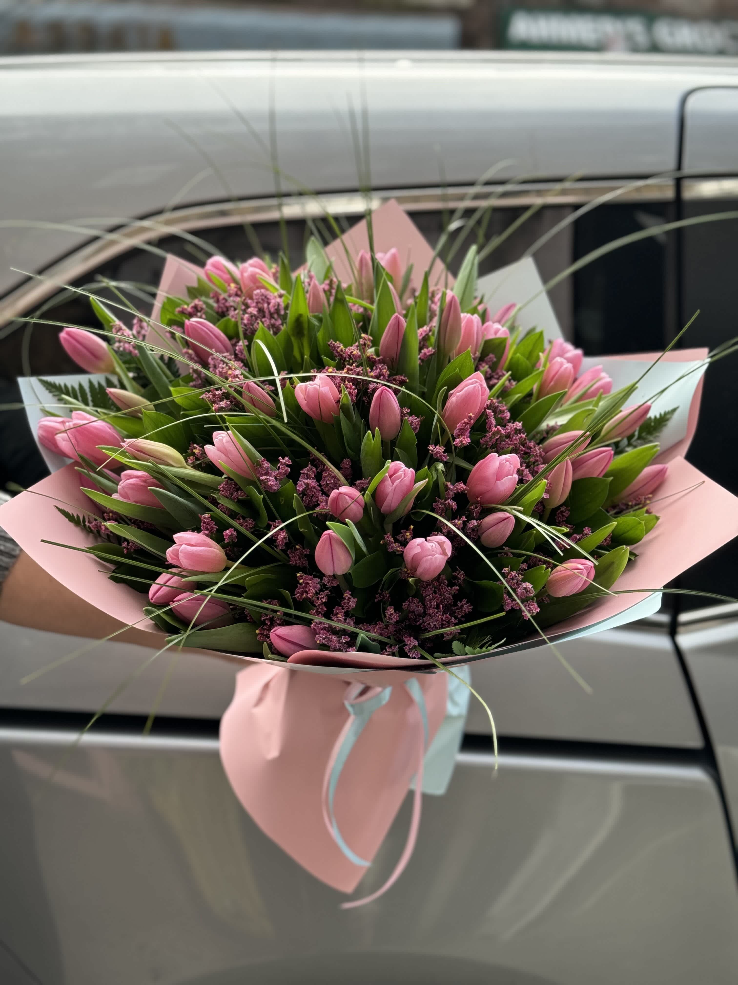Pink tulips bouquet.The photo shows a deluxe size. - The photo shows a deluxe size.