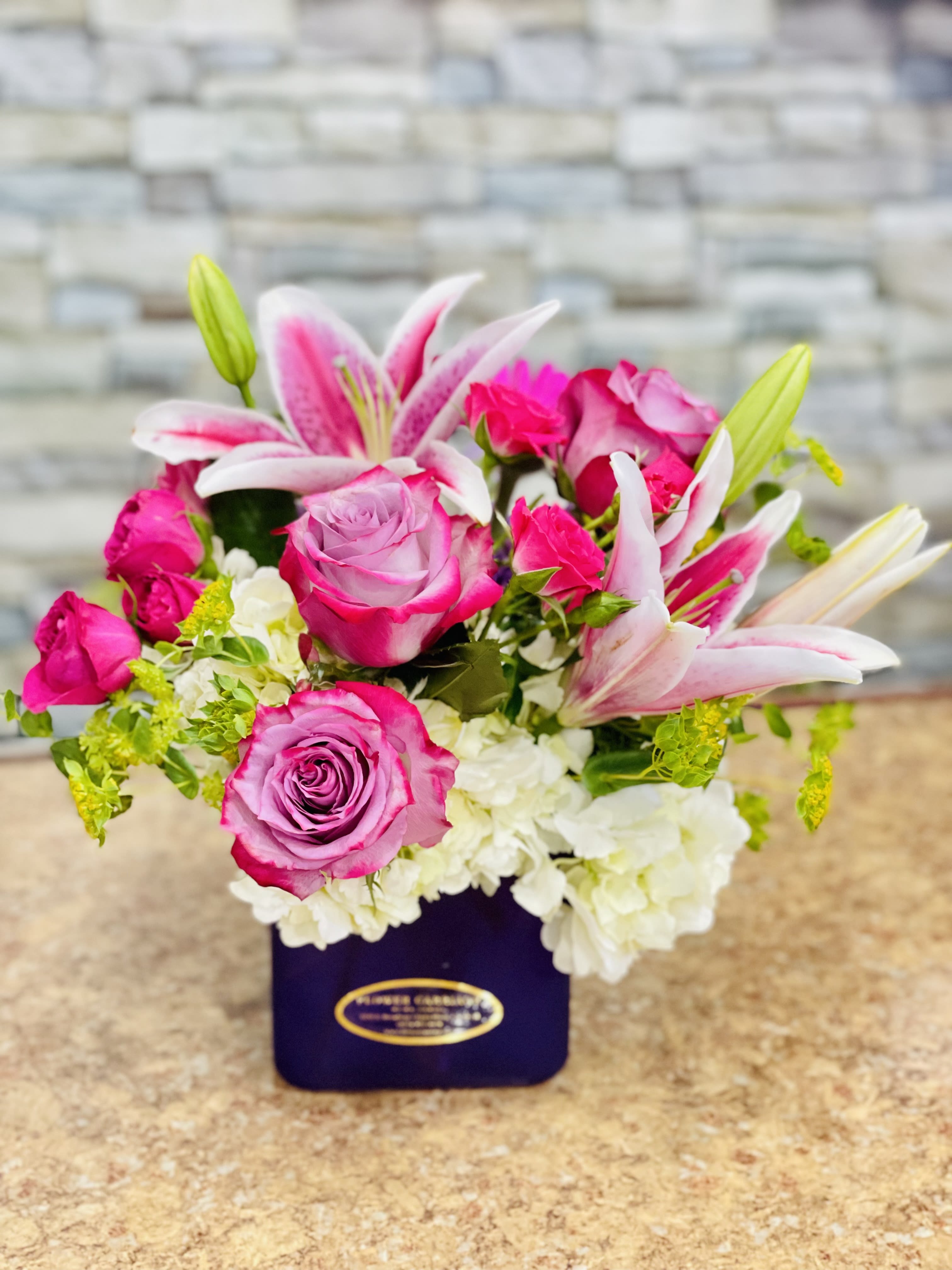 My Sunshine By Flower Carriage  - Share what's in your heart with this warm and sunny vase arrangement; overflowing with roses, hydrangea, Gerbera daisies and your good wishes.