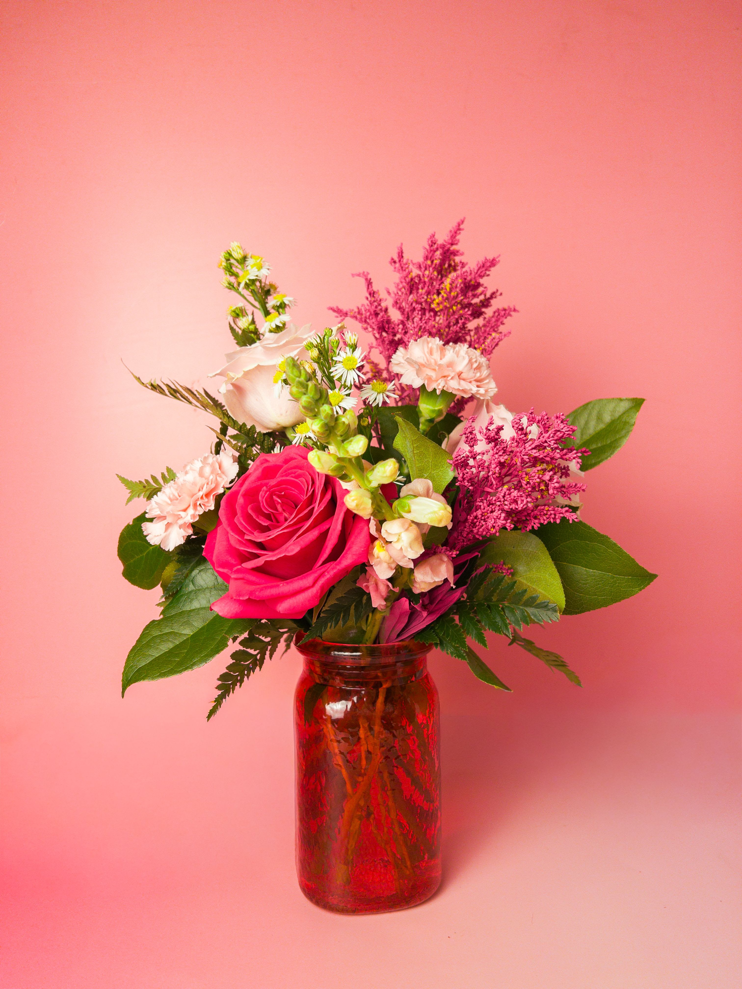 Blush Theory Arrangement - Celebrate Mom with the soft beauty of Blush Theory, a charming Mother’s Day flower arrangement designed in a pink vase and filled with blooms in different shades of pink. This elegant design brings together romantic tones and seasonal flowers to create a sweet and thoughtful gift that feels both classic and modern. Perfect for Mother’s Day brunch tables, living rooms, or office desks, this arrangement adds a warm touch of springtime beauty to any space. As a trusted Baltimore Florist, we carefully design each arrangement using fresh, high-quality flowers. Whether you are celebrating Mom, a grandmother, or a special mother figure, our reliable Flower Delivery in Baltimore makes it easy to send love right to her doorstep.