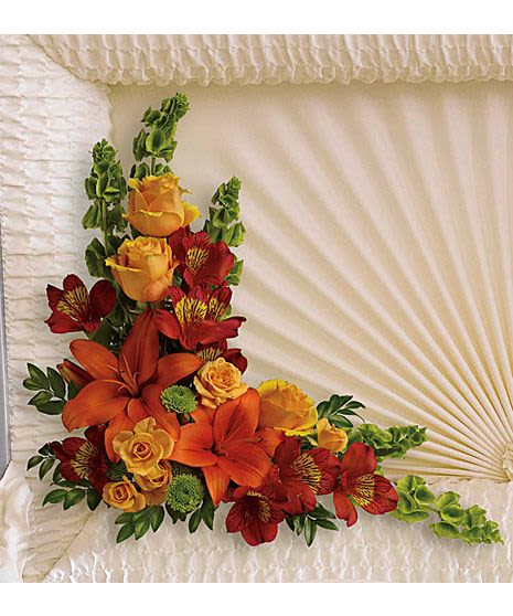 Golden Hour Farewell Casket Arrangement - This arrangement is a nod to the warm, glowing colors that symbolize a life full of light.