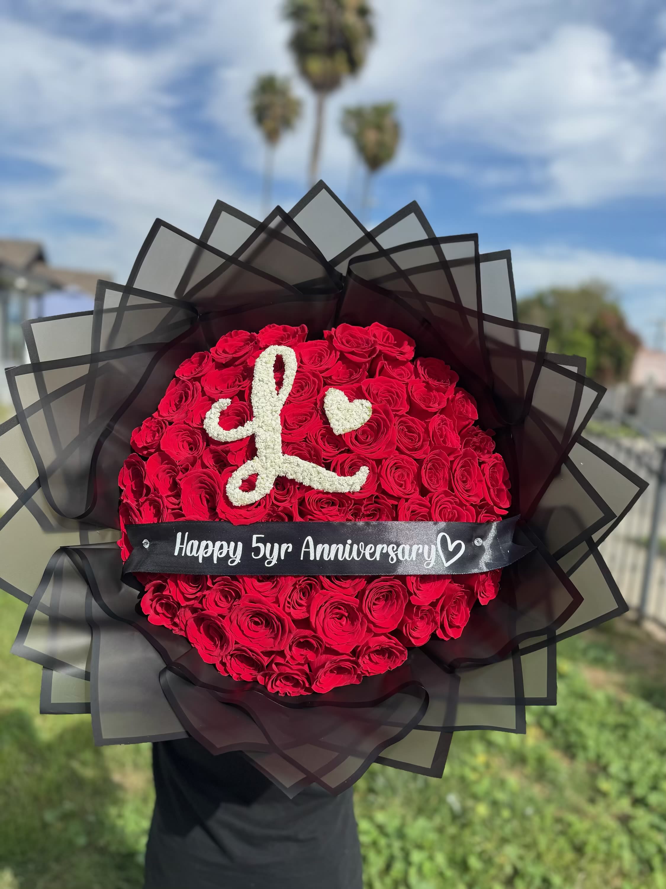 Red Ramo Buchon with Initial &amp; Ribbon  - Red roses with your choice of baby’s breath letter and personalized ribbon.   Indicate wrapper color preference in the notes to florist section - if nothing is noted standard color is black. 
