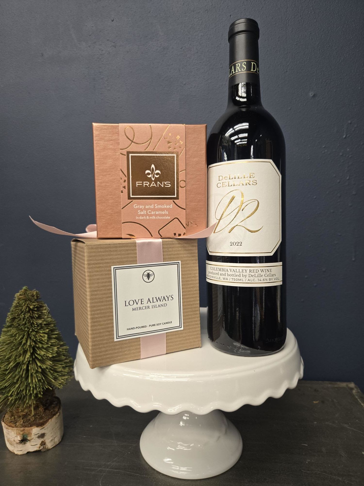 Love Bundle - Send hugs and kisses with the help of DeLille Cellars, Fran's Gray and Smoked Salt Caramels in dark and milk chocolates, and our Love Always Candle.   D2 is a red blend, and pairs beautifully with the favorite Fran's caramels. The Love Always candle is a soy wax with leather, tea, &amp; pomegranate scent. Candle has 60 hrs of burn time. 