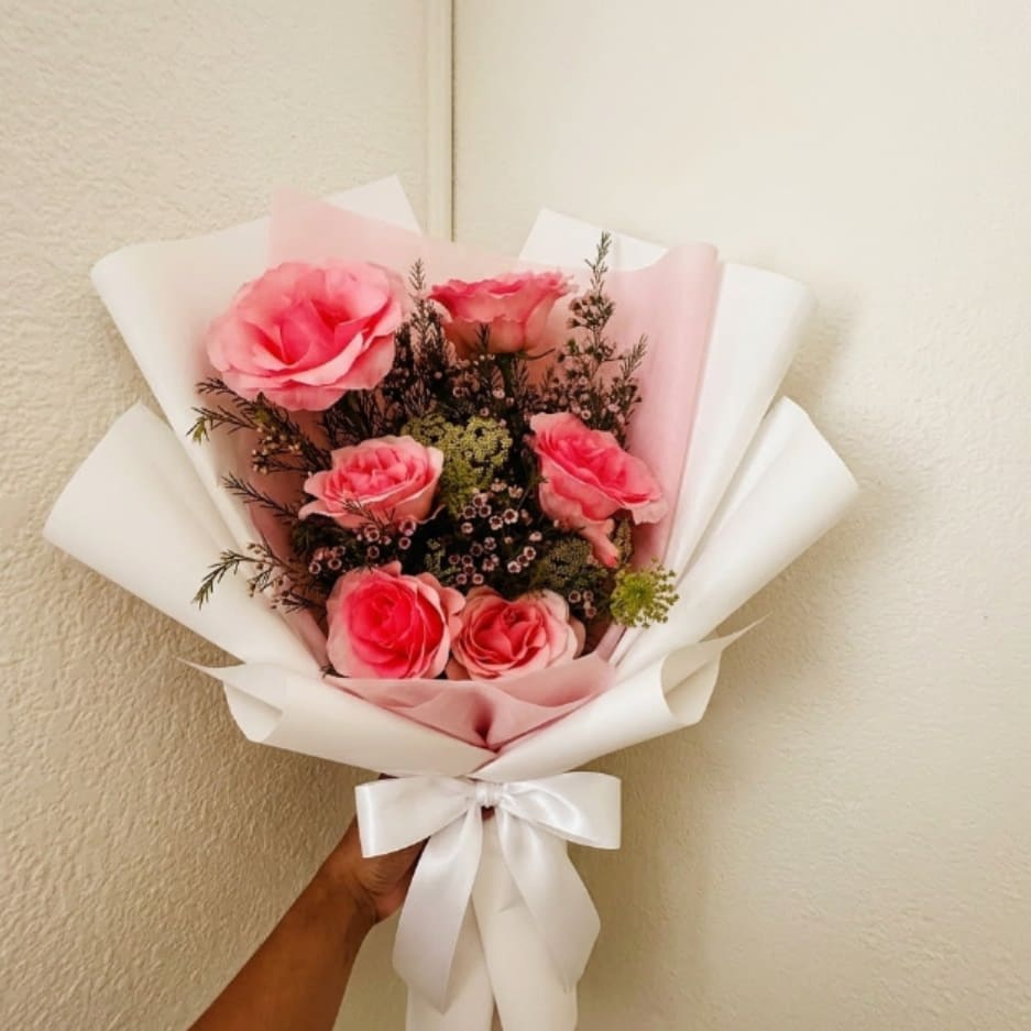 Soft Steps - Elegant, gentle, and meaningful—Soft Steps represents the beautiful new journey of parenthood. Premium pink roses and airy Queen Anne’s Lace combine for a sophisticated, high-end gift that celebrates life’s newest chapter.  This seasonal bouquet features:  Premium Light Pink Roses  Queen Anne’s Lace  Starry Pink Waxflower  Garden Greens  Presentation: Expertly wrapped in our signature textured paper and tied with satin ribbon. Prefer a vase? Add one to your cart to complete the look.  Personal Touch: We’ll include a custom card message with every order. You’ll be able to write your message at checkout.  Please Note: All flowers are subject to seasonal availability. If a specific bloom isn’t available, our designers will thoughtfully substitute with flowers in a similar shape, style, and color.  Standard size shown. Vase upgrade is optional.   Floral Care Guide  Your arrangement arrives in our signature "double wrap" and is nestled in a protective box. While the stems are secured with a wet wrap for transit they are ready for a full drink!   Unpack: Gently lift the bouquet from the box. Remove the plastic bag and wet towel from the stems. Trim &amp; Hydrate: Trim 1/2" off stems at an angle and place in a clean vase with cool water. Refreshed: Change water daily for a long-lasting bloom.  