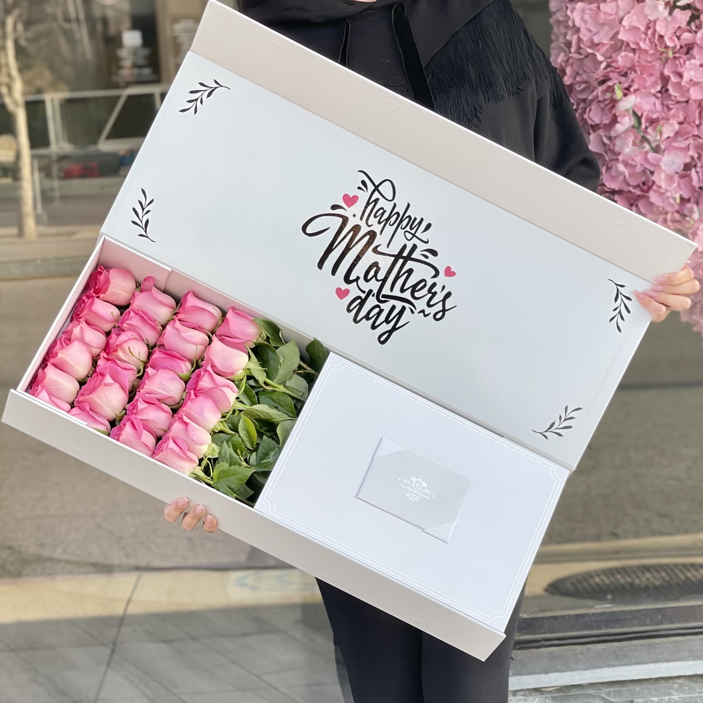 Box of pink roses with a "Happy Mother's Day" message