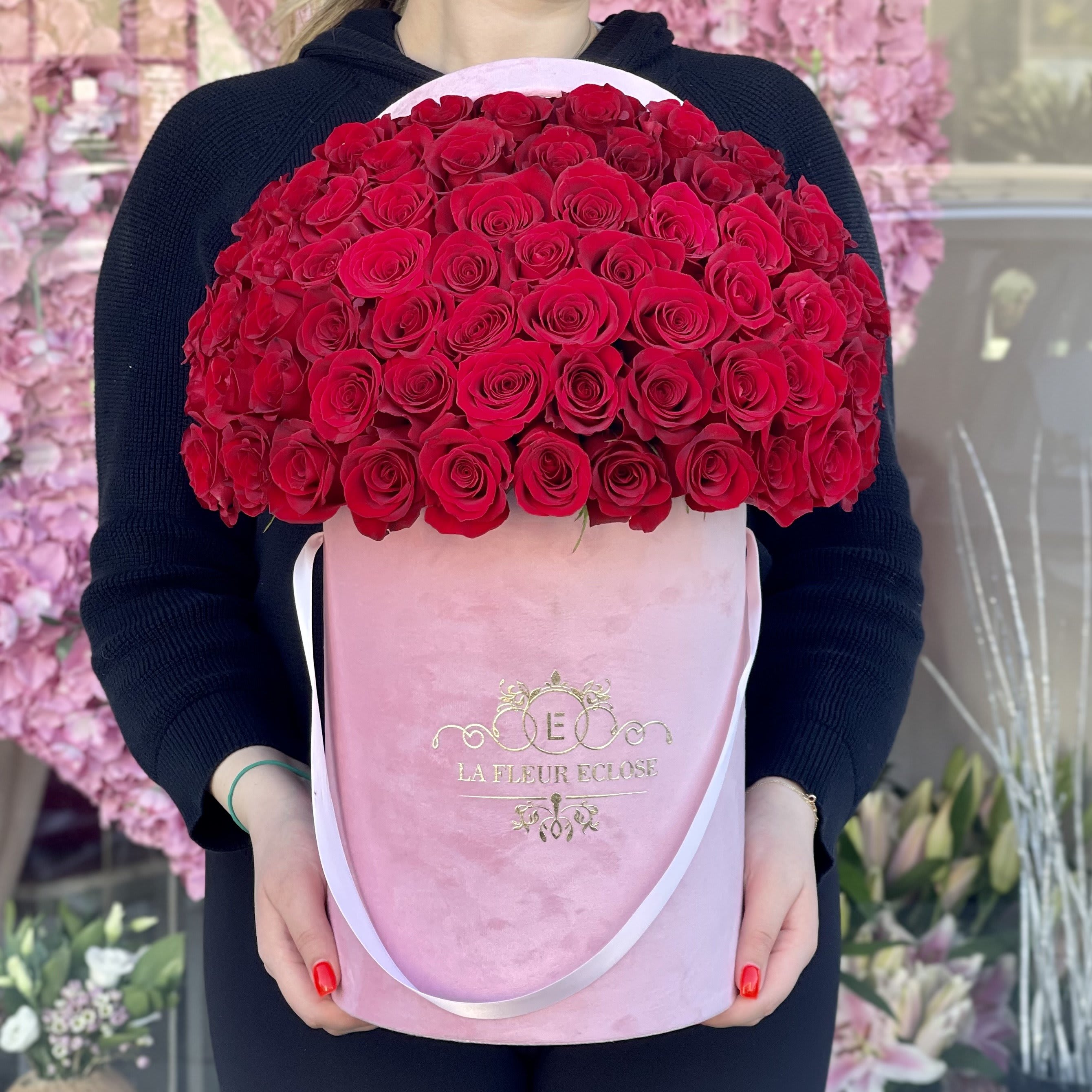 Honey Baby V - FRESH CUT ROSES Standard 50 and Deluxe 75 red roses in our signature pink velvet box.