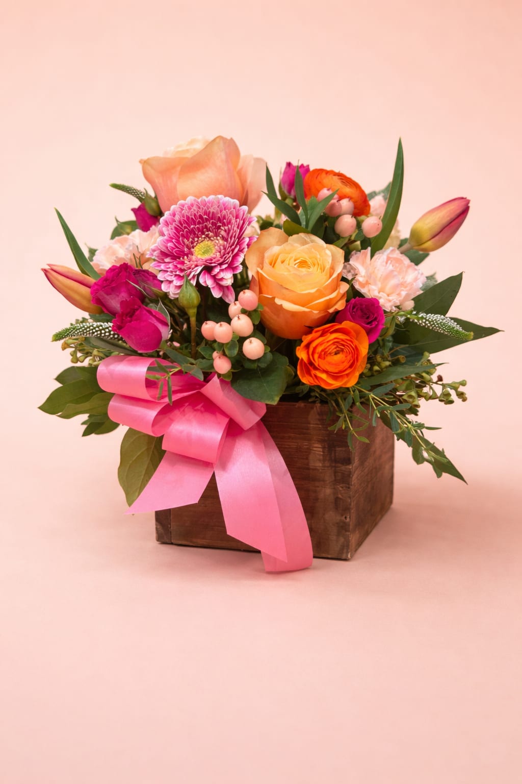 Administrative Professionals Day Special - Pink and orange roses, ranunculus and daisies arranged full in a rustic wooden box with pink ribbon