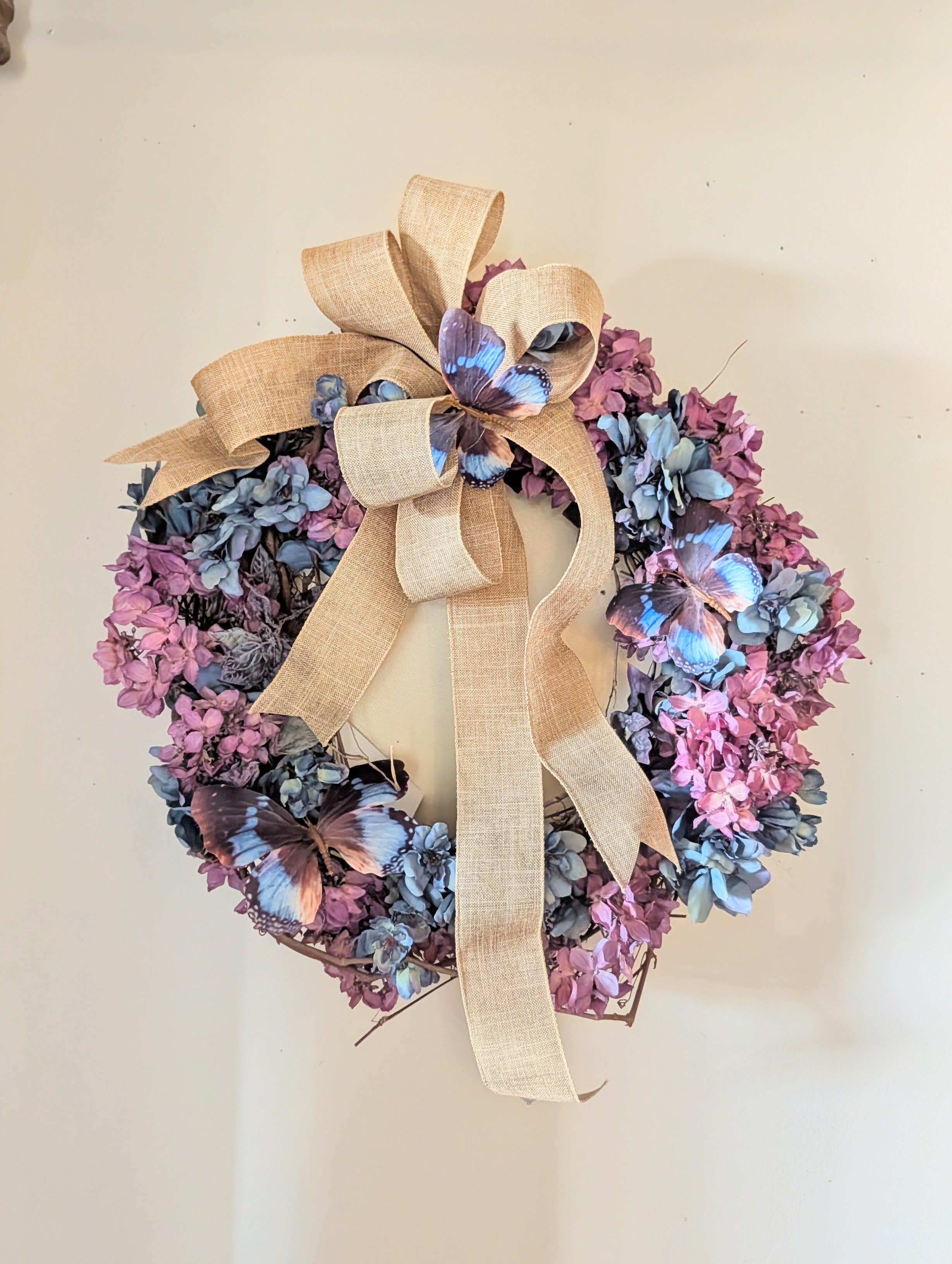 Shades of Indigo Permanent Botanical Wreath  - Accent your home or office with our Shades of Indigo Permanent Botanical Wreath.