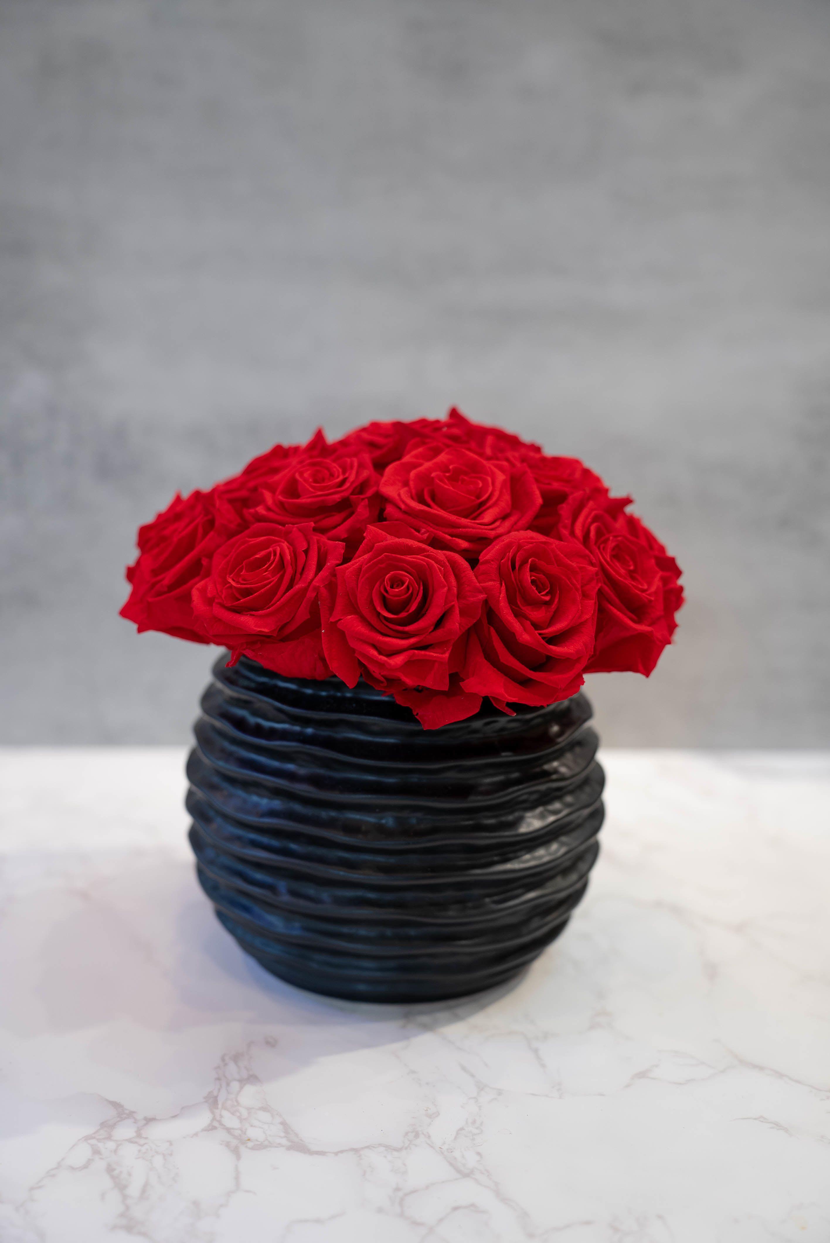 Red Preserved Roses in black bubble vase  - High end preserved roses, custom designed by hand in our local shop