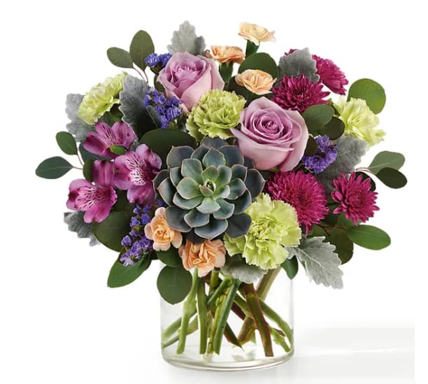 Botanical Dream - Ground yourself in the soothing hues of green and purple with roses, carnation, chrysanthemums, and eucalyptus  in the Botanical Dream Bouquet. Whether you’re treating yourself, sending a smile, or celebrating a big day, this bouquet is sure to please.