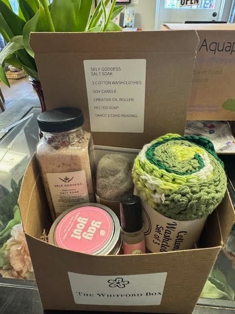 The Whitford Box  - Meet The Whitford Box—our signature gift designed to wrap someone in pure, effortless luxury. Thoughtfully curated by our team, this indulgent collection features our staff’s favorite self-care essentials, chosen for their quality, beauty, and ability to turn an ordinary moment into something truly special.  Inside, you’ll find a handpicked mix of elevated pampering pieces—think soothing scents, rich textures, and little luxuries that invite you to slow down and savor. Every item is selected with intention, creating a gift that feels both personal and unforgettable.  Perfect for celebrating, comforting, or simply saying “you deserve this,” The Whitford Box is more than a gift—it’s an experience of care, calm, and a touch of everyday elegance.