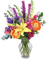 Colorful mixed bouquet in a clear glass vase