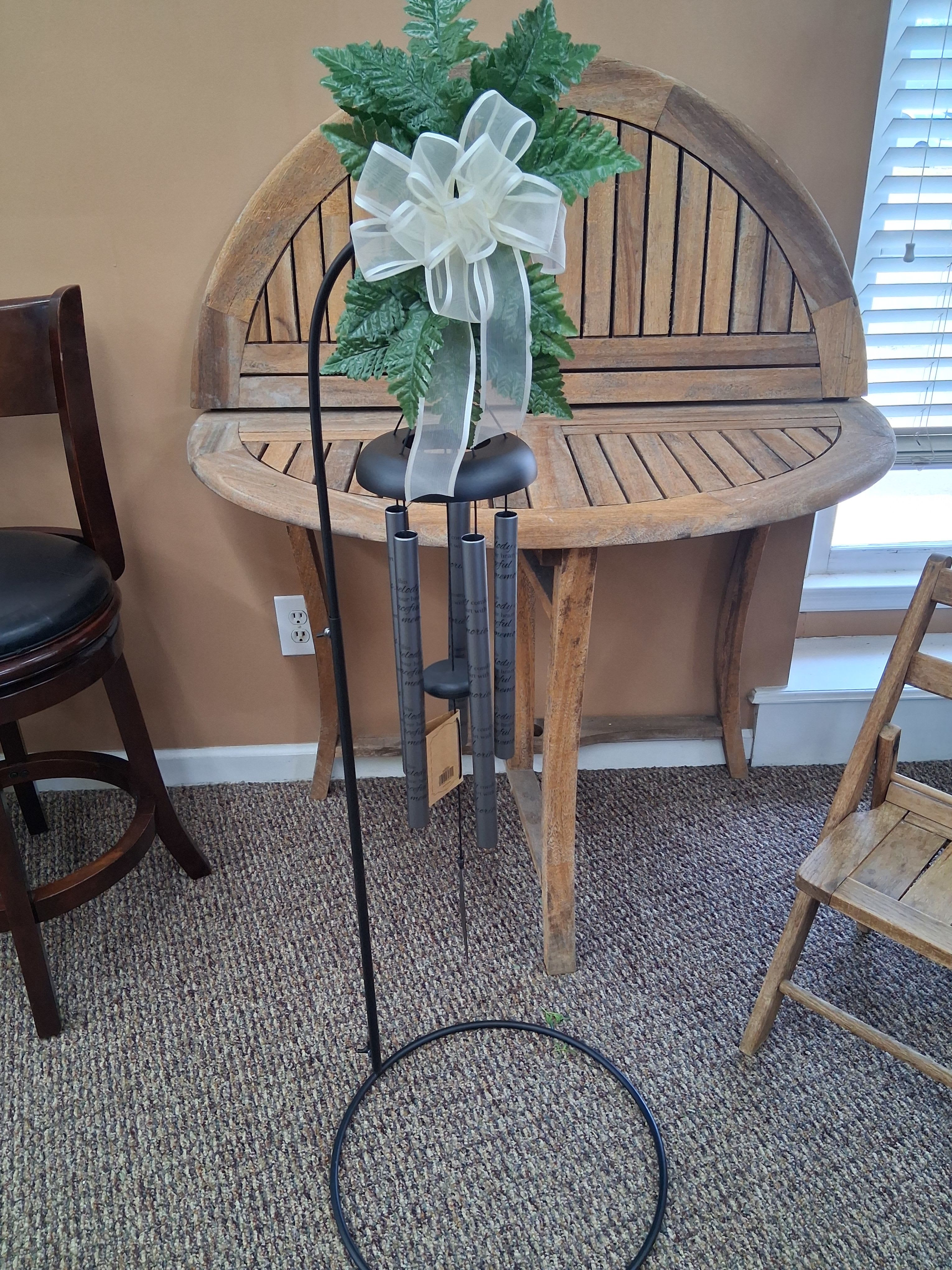 Beautiful Memories Wind Chime Charcoal  - 30" Wind Chime On Stand  Cames with stand, silk greenery, and bow. Inscription Reads Beautiful Memories You left us beautiful memories, your love is still our guide, althought we cannot see you, you're always by our side