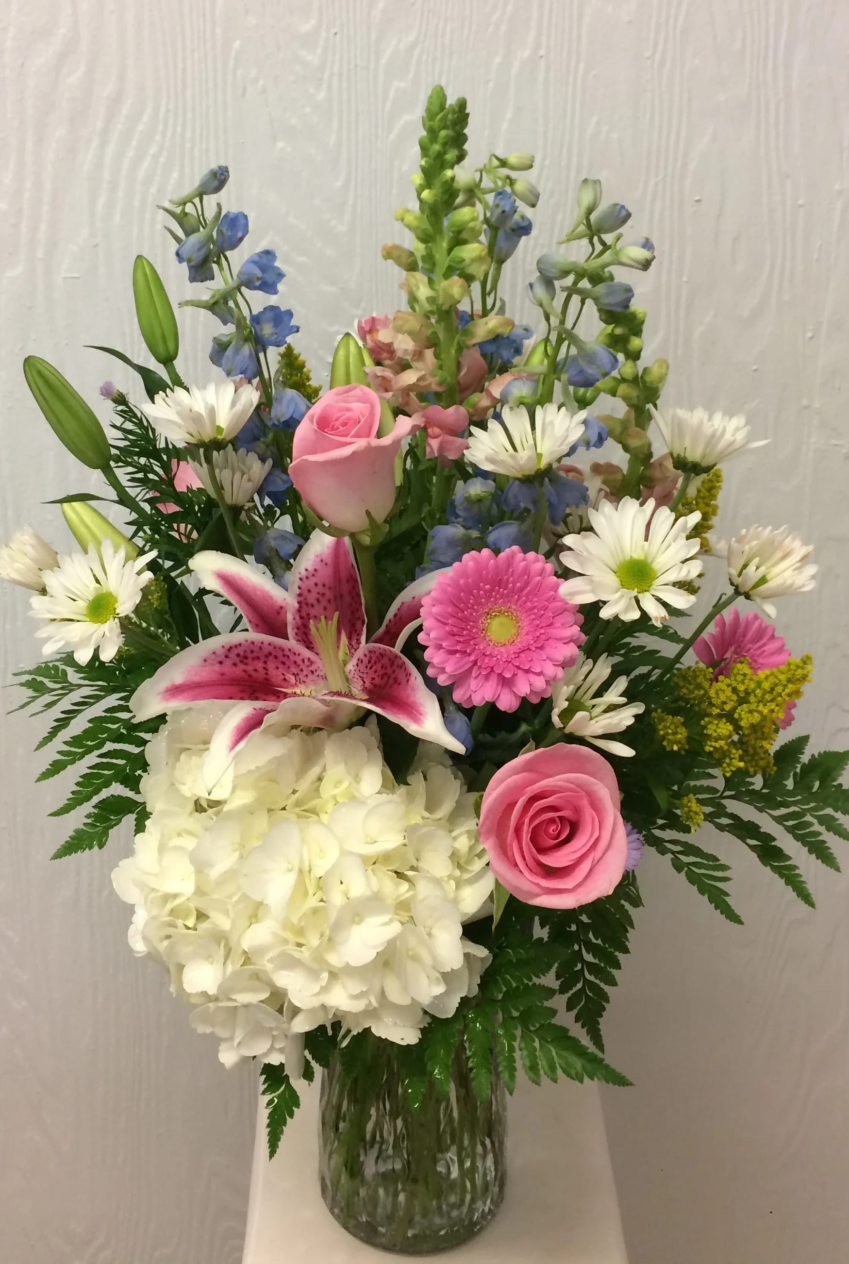 Just for Mom - Ruth Messmer Florist's Just For Mom bouquet is Professionally designed with hydrangea, snapdragons, delphinium, roses, stargazer and gerbera daisies. Approx. 24" tall by 15" wide.