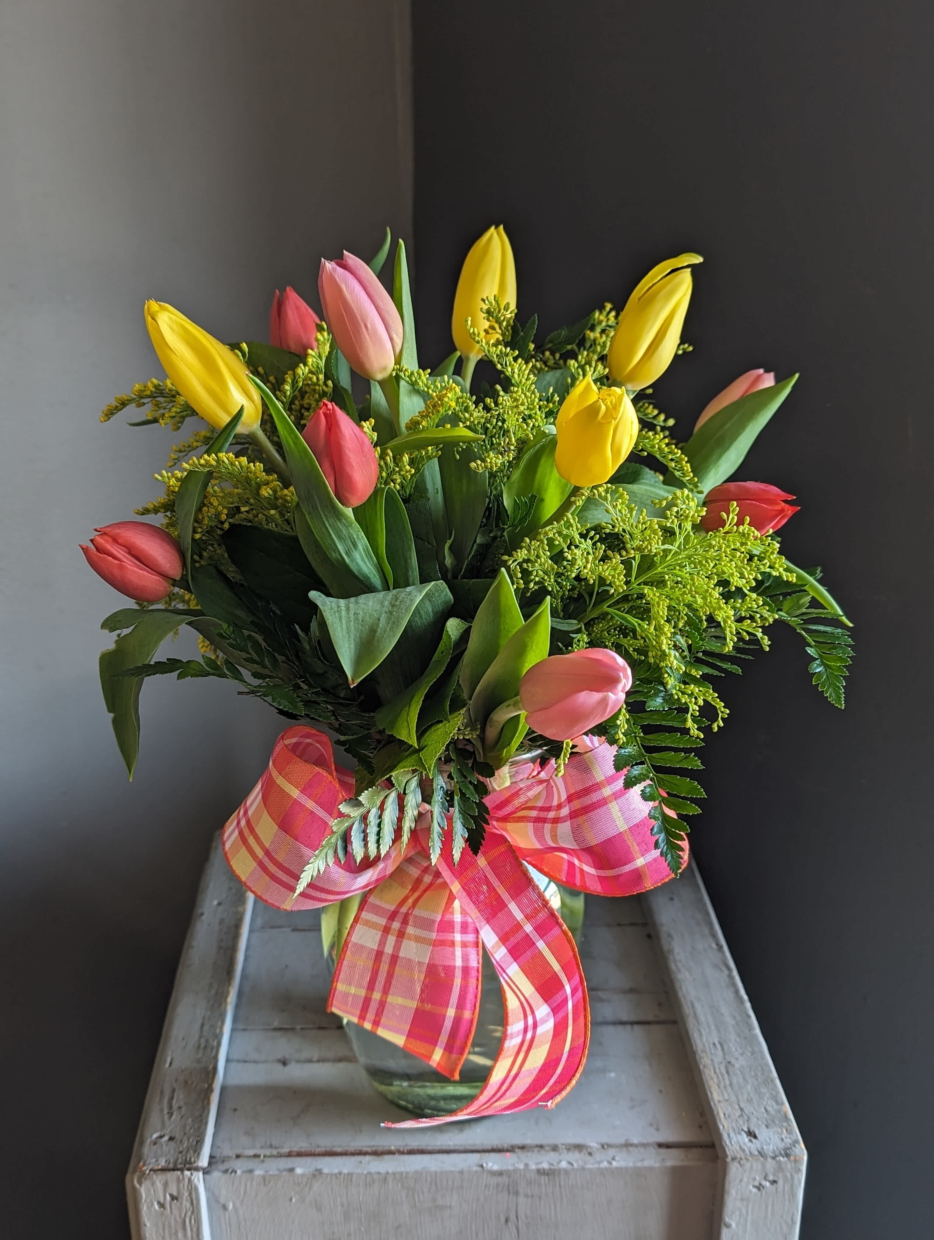 Tulips Gathered in Vase - Tulip color and filler may vary!  A mix of colors, simple, small, sweet and elegant tulips. Need I say more!?