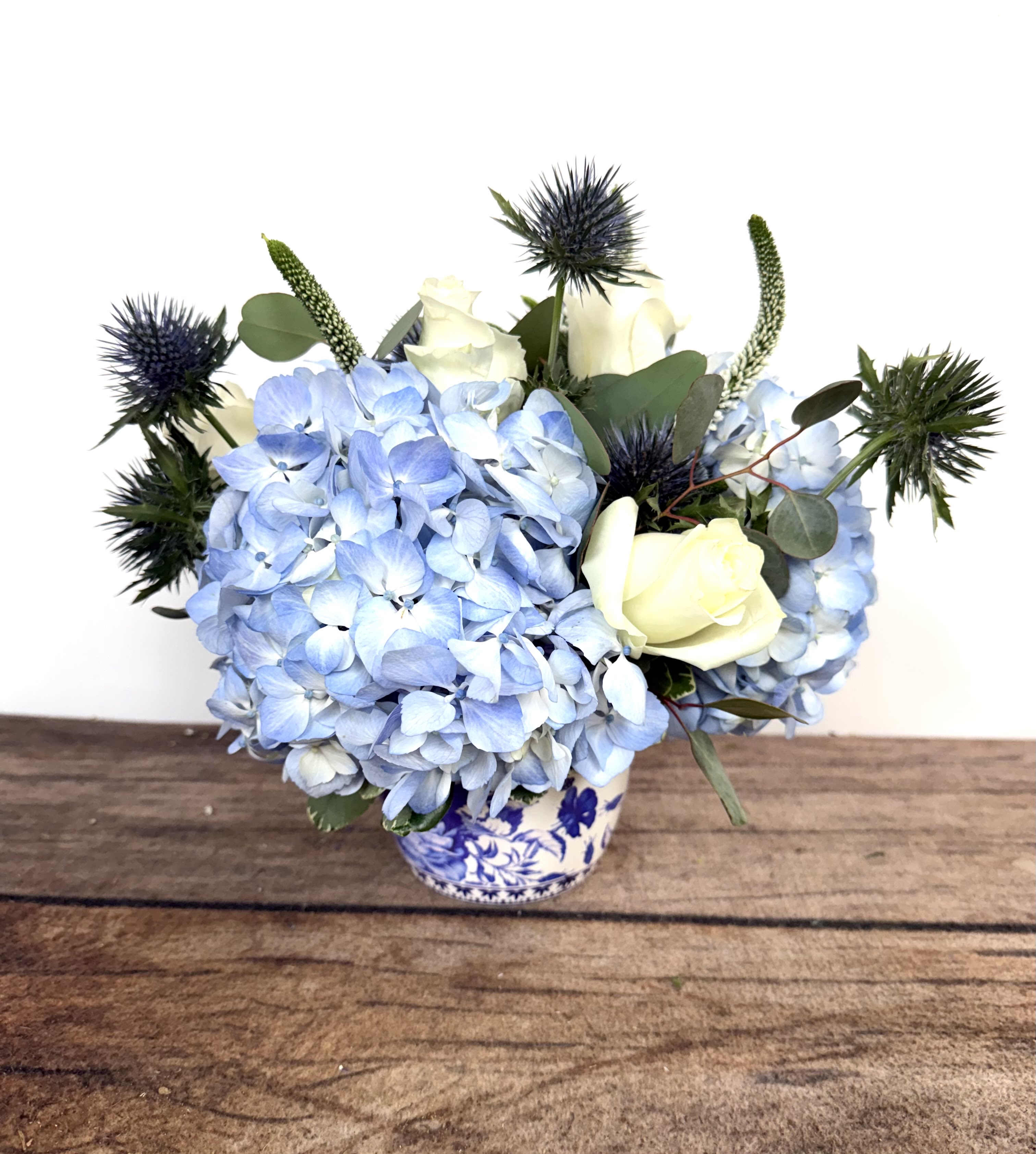 Aquamarine - Blues and whites grace this keepsake vase.