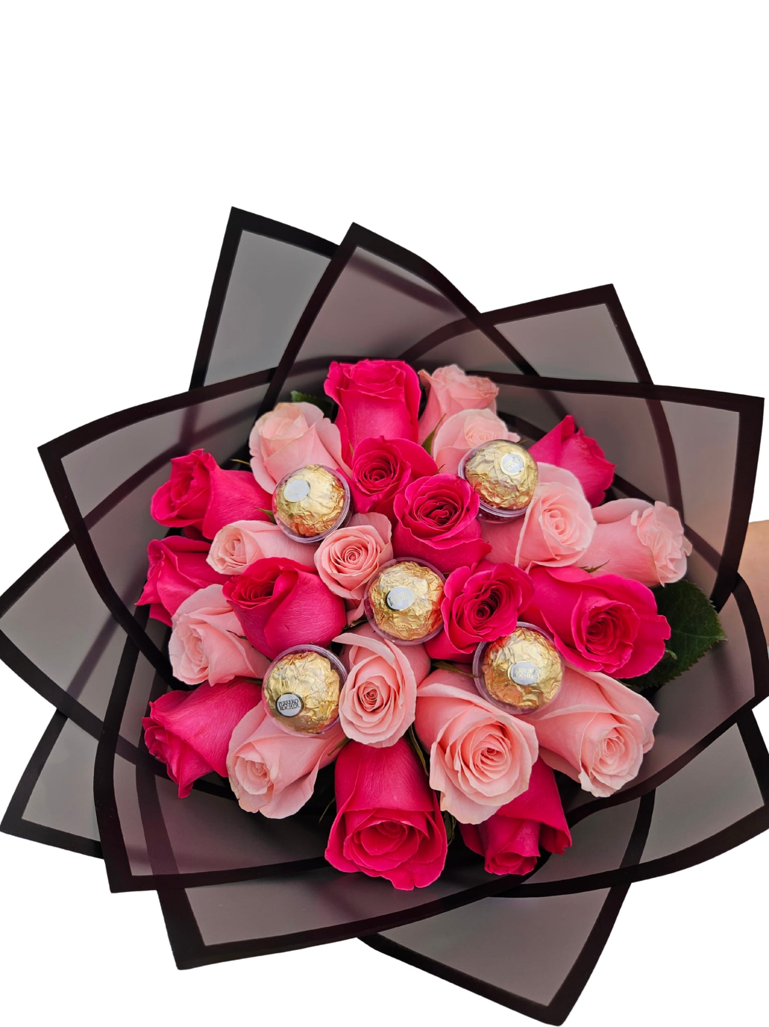 Bouquet of pink roses with Ferrero Rocher chocolates wrapped in dark paper