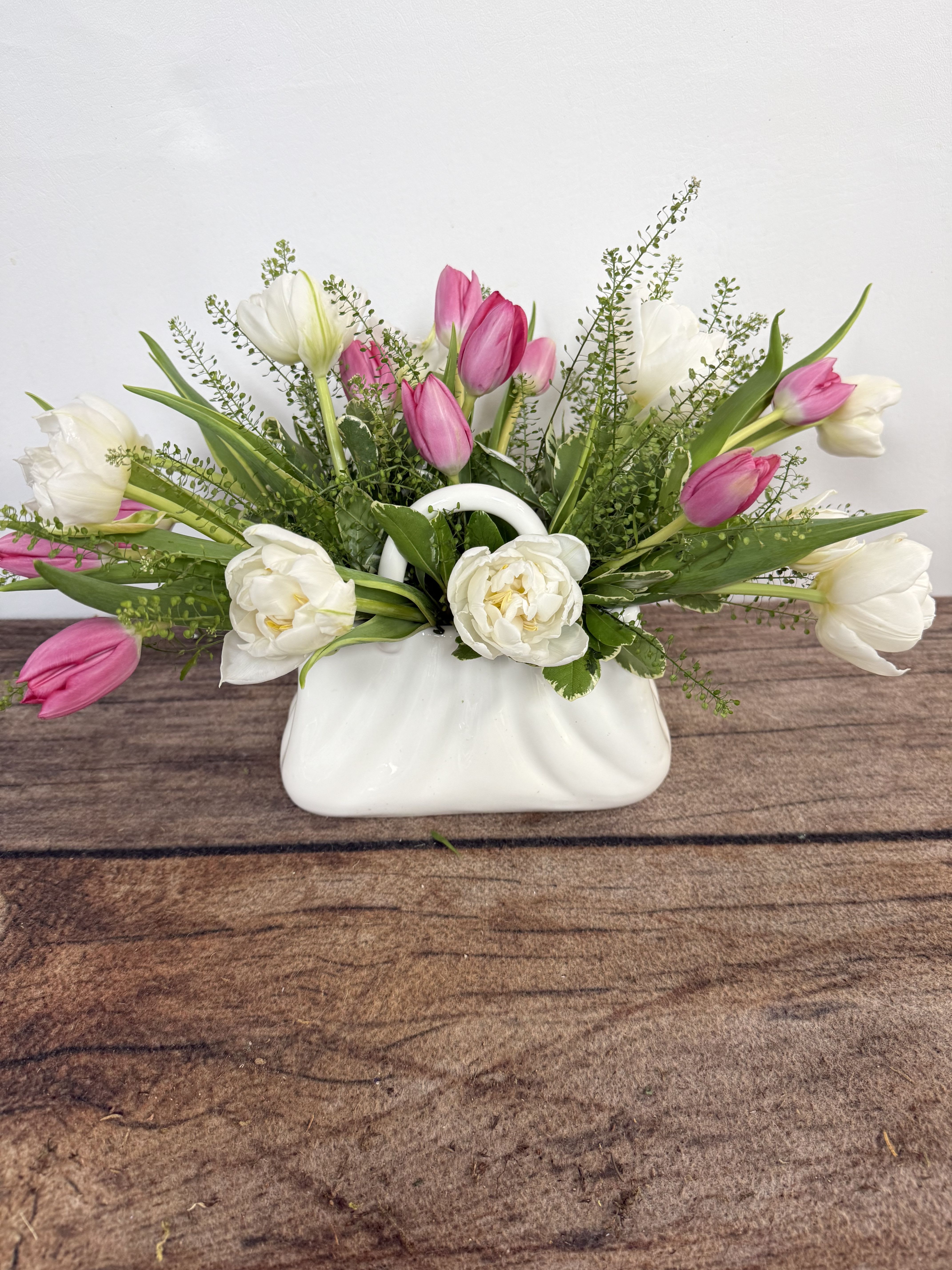 Bijou - Cute ceramic purse holds Spring's beautiful tulips. Approx. 10"h x 12" w. Purse is 7"x7". 