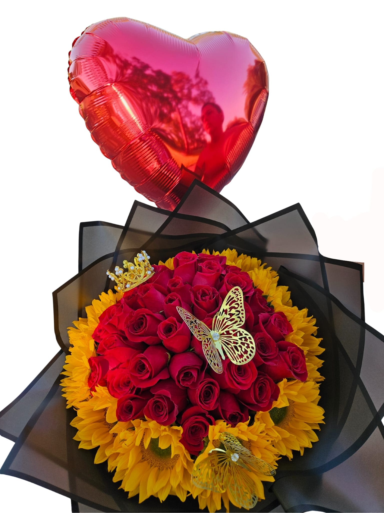 Bouquet of red roses and yellow sunflowers with a heart balloon