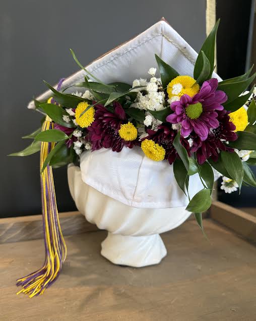 Grad Cap Flower Crown - The fun new graduation accessory! An easy to wear flower crown that will wow in all of your pictures. Customizable with school colors.