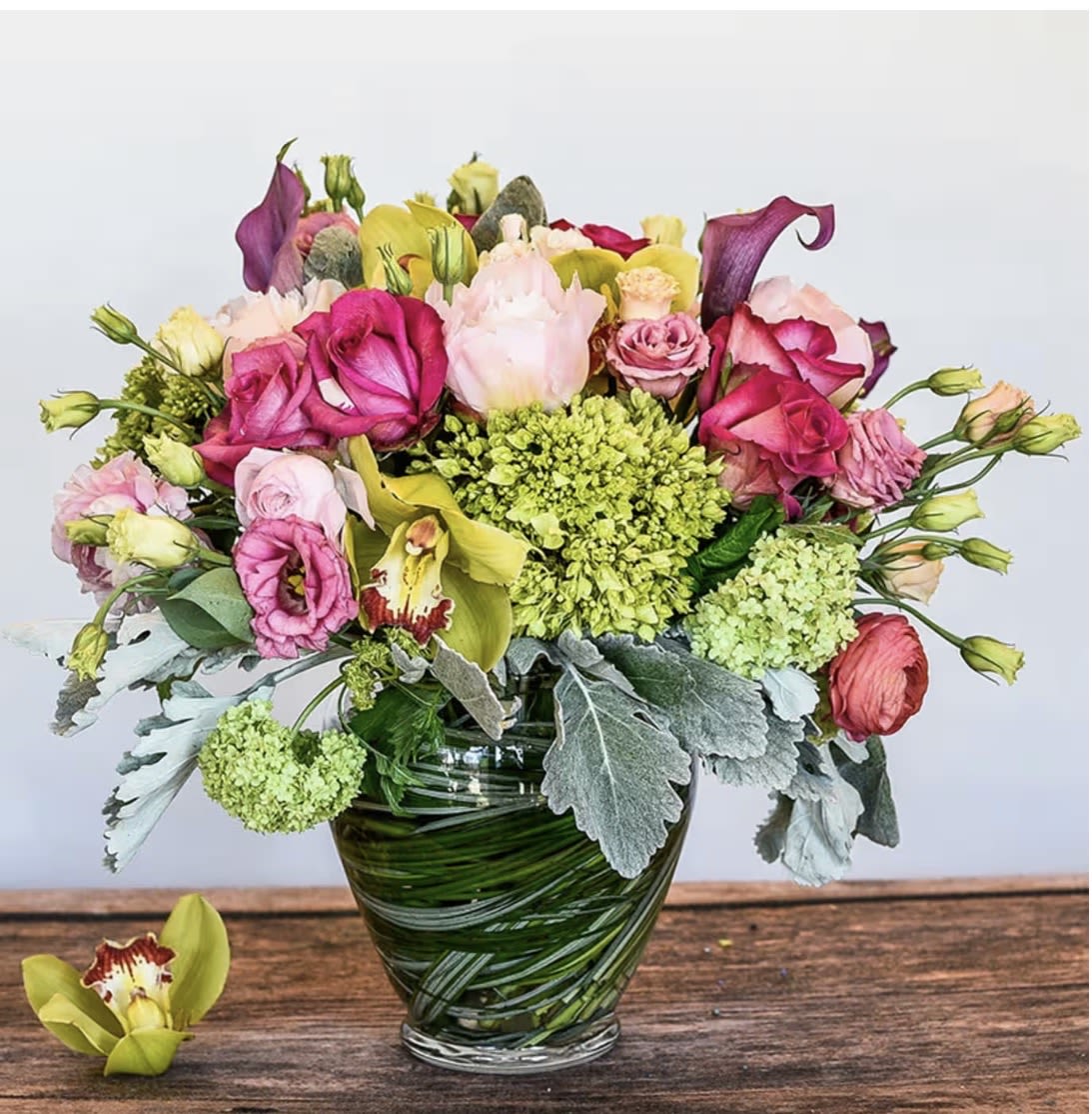 Bling - Feminine display of pastels, soft and elegant in a mid height vase. Approx 18"h x 12"w 