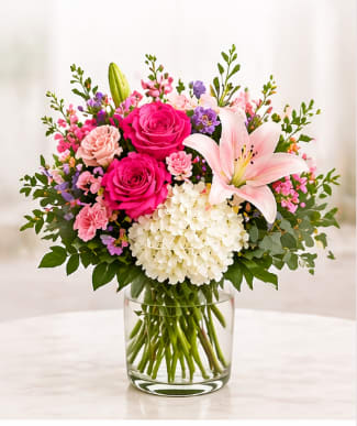 Mike’s Designer Choice – Standard Same Day Delivery - Mike’s Designer Choice is a fresh, hand-designed arrangement created daily using the best flowers available. Each bouquet is unique while maintaining a colorful, balanced, and premium look.  This design features seasonal blooms such as roses, hydrangea, stock, and now includes pink lilies for a soft, elegant touch.  All arrangements are prepared for same day delivery and handled by Mike, one of our highest-reviewed drivers, known for reliable, professional service.  Perfect for birthdays, anniversaries, or just because.