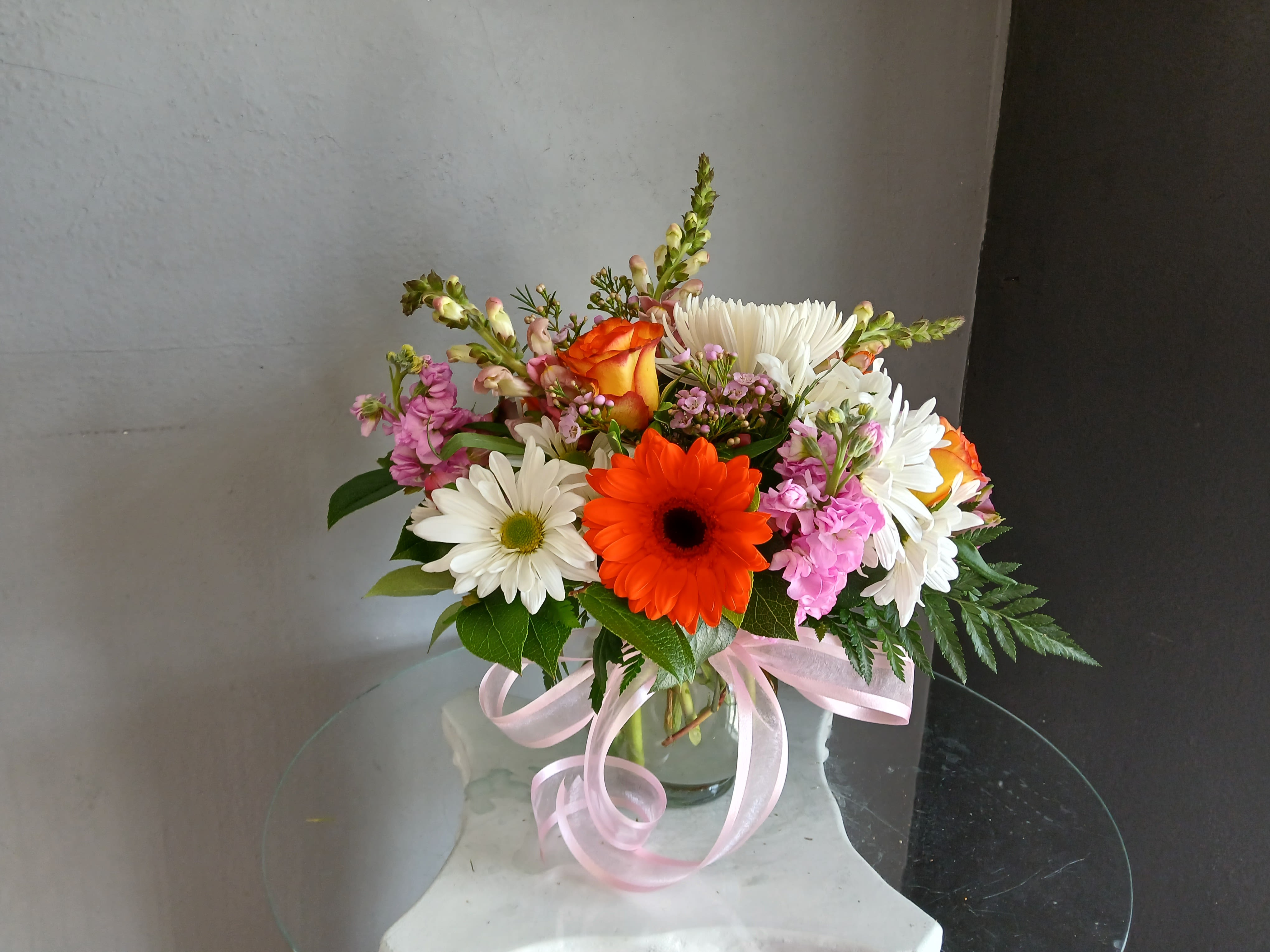 #701 Designer's Choice Vase Arrangement - This beautiful flower arrangement of fresh mixed seasonal blooms is made by local designers in the heart of Orange California. Hand crafted and perfect for every occasion, from birthdays and new babies to sympathy and just because. The best choice to show you are thinking of that special someone. Can be sent as a local delivery or in-store pickup. This is an original, one of a kind arrangement. Order now before it's too late!