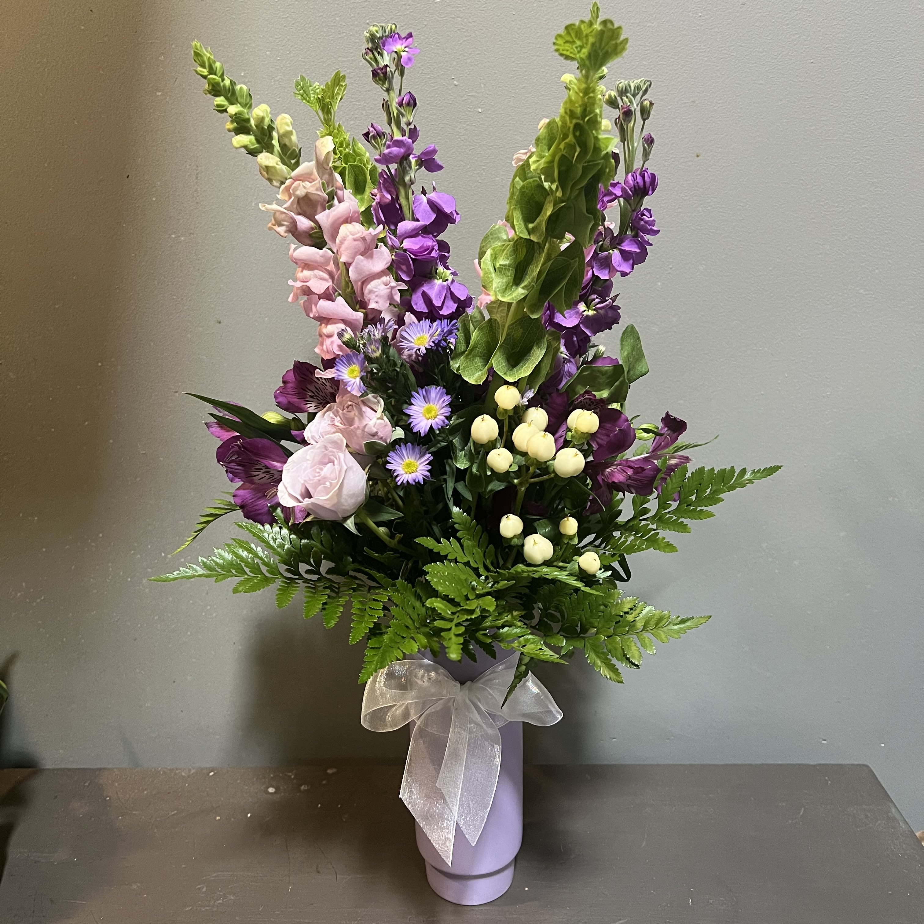 Bold Beauty - Bold mix of blooms!  Measures approx. 23"Tx13"W and arrives in a glass vase.