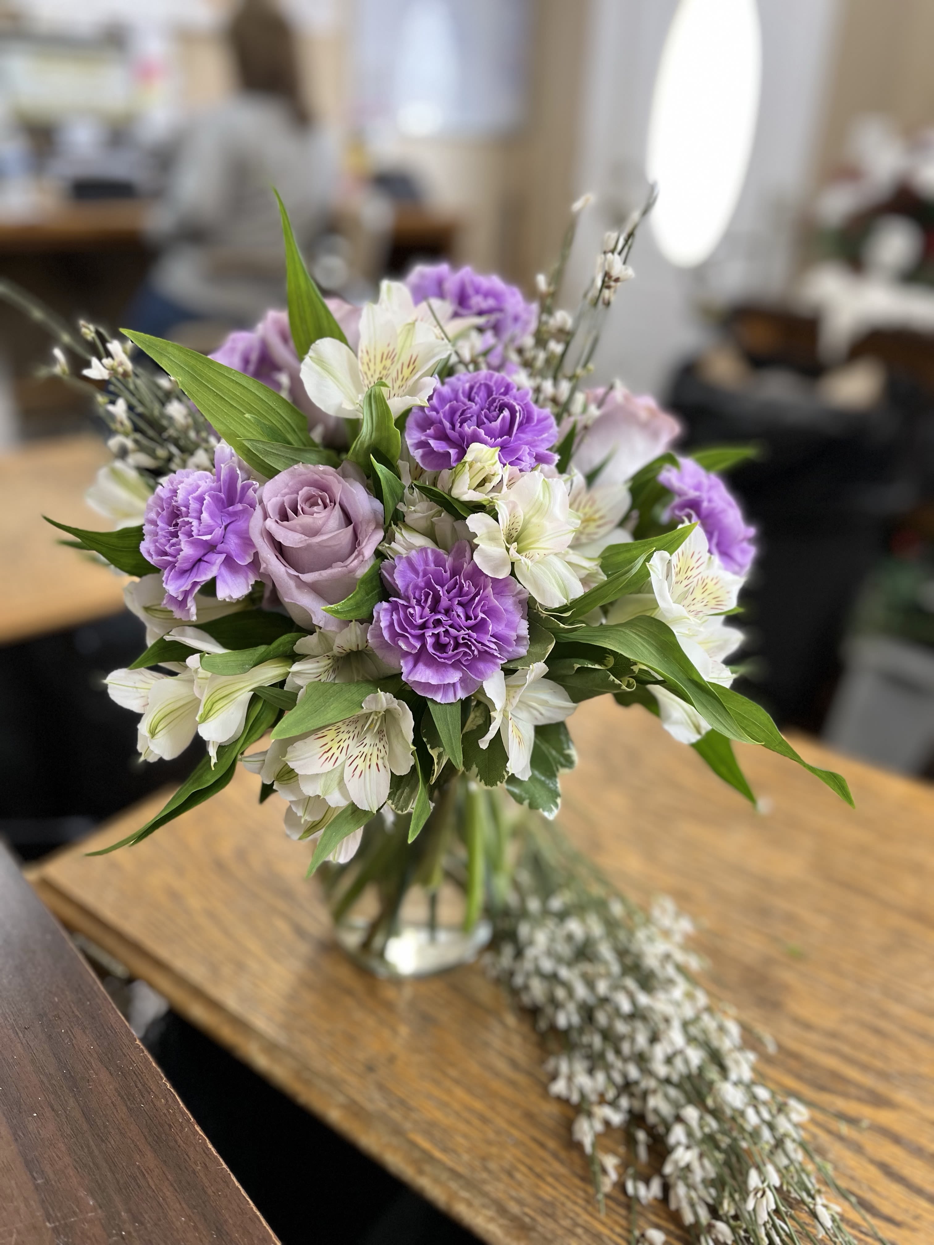 Lavender Love  - A vase of love! This long-lasting gift of a happy fresh flowers and green leaves, will brighten up their day. This pretty arrangement features a lavender mix 