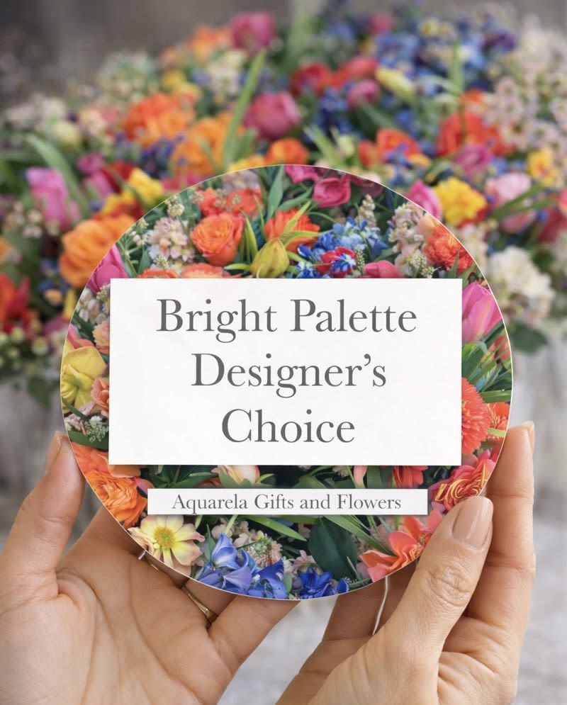 Round card with bright mixed flowers and the text Bright Palette Designer's Choice