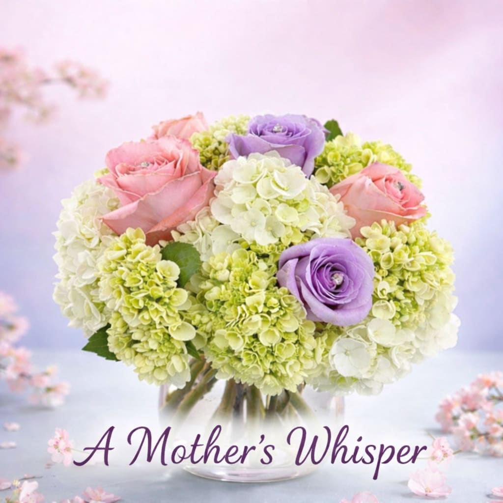 A Mother's Whisper Bouquet - LIMITED AVAILABILITY  5/5/25 - 5/12/25 ONLY  A designer's choice fresh basket arrangement. Mixed fresh florals in a basket.  Flowers will vary in this arrangement depending on stock. Most beautiful flowers, accentuating and greenery.