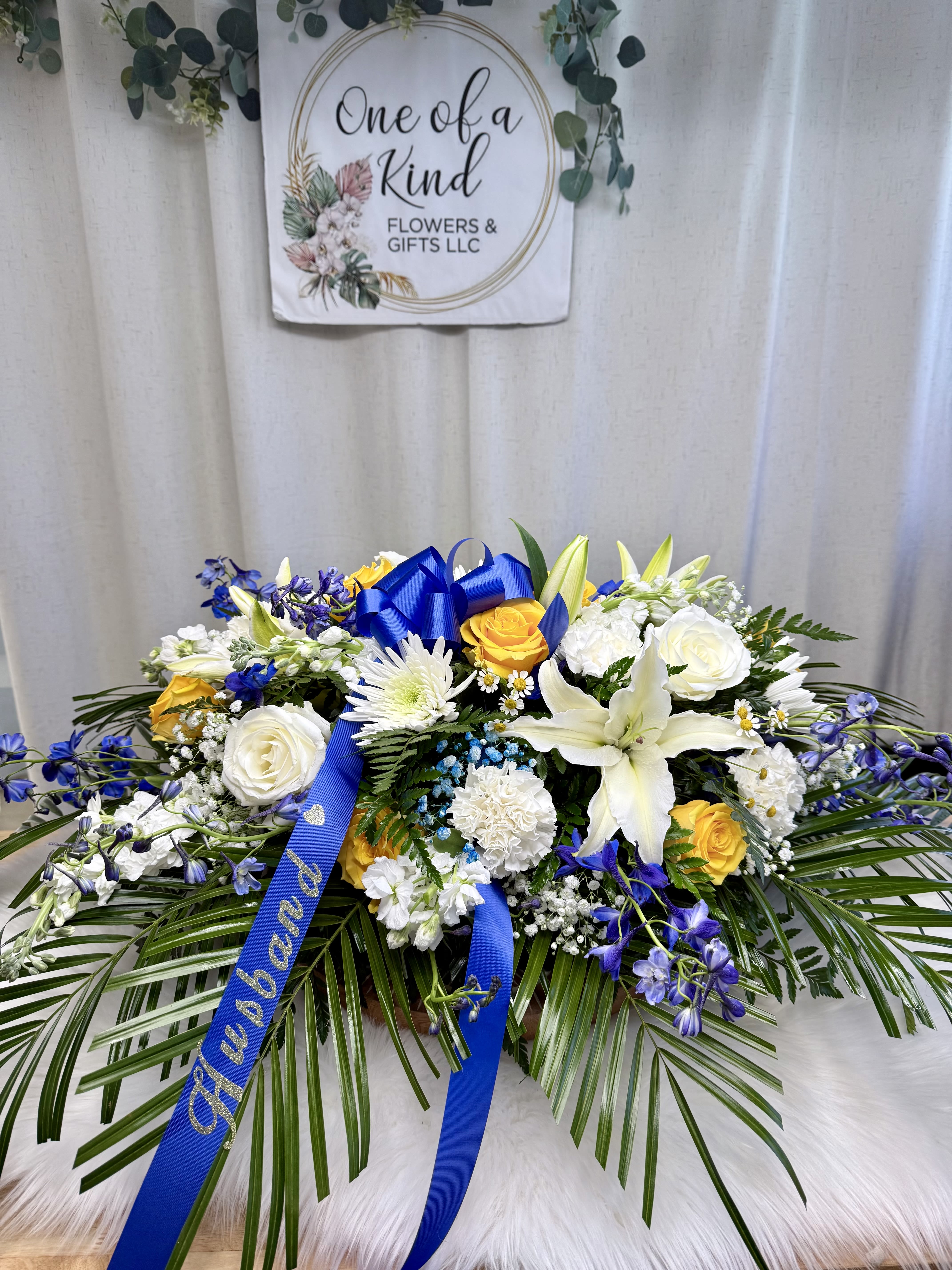 Casket Spray - An elegant and moving floral casket arrangement, designed with love using a selection of flowers in the colors of your choice. Each bloom has been thoughtfully arranged to express love, remembrance, and deep respect, creating a beautiful tribute that honors a cherished life that will never be forgotten.