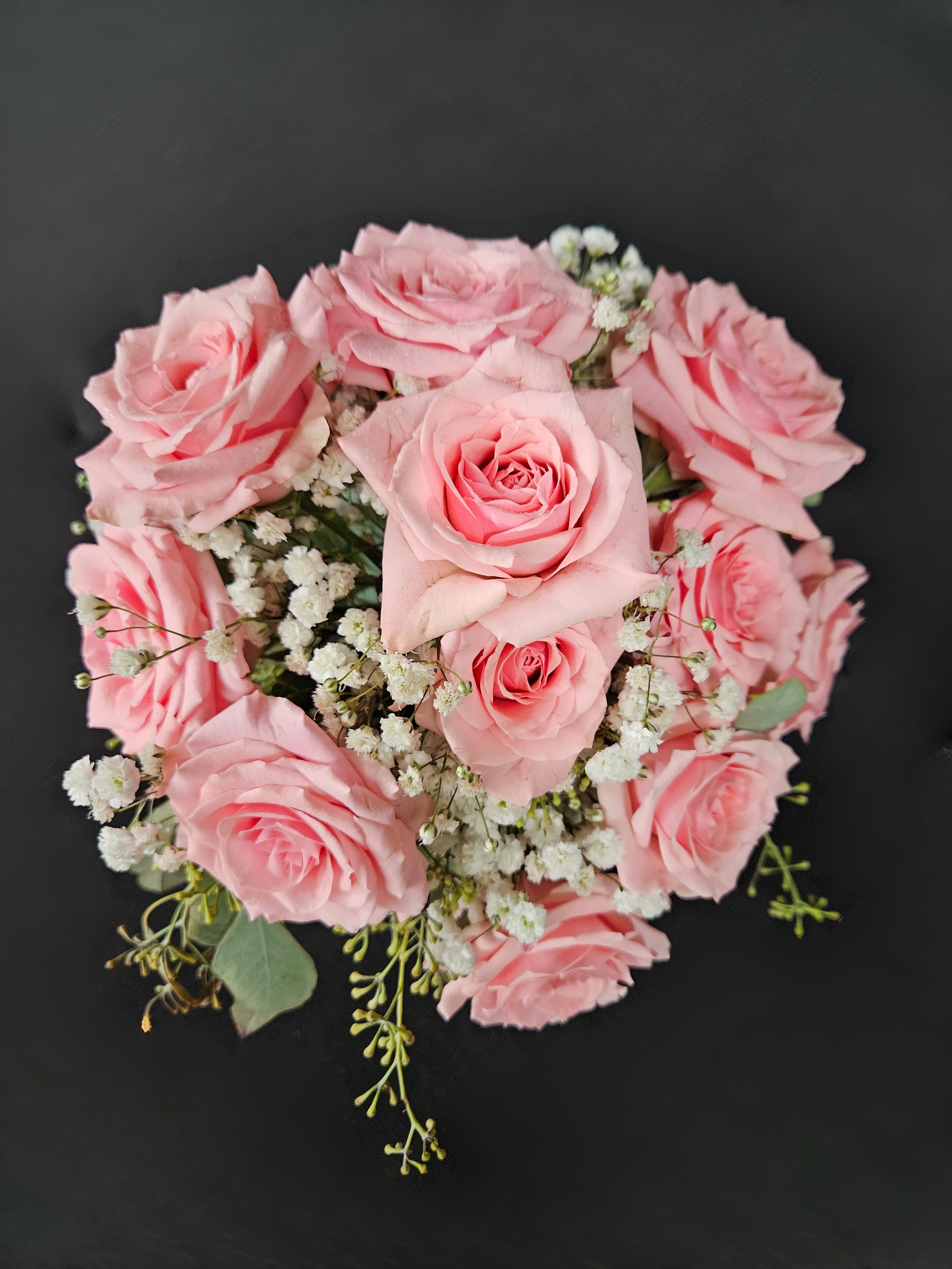 Spray Rose Handheld Bouquet - A classic 5 stem spray rose bouquet hand-tied with satin ribbon that compliments any outfit. A beautiful addition to any prom or homecoming event. Please select the flower color you would like and the ribbon color from the add-on selections to be included.