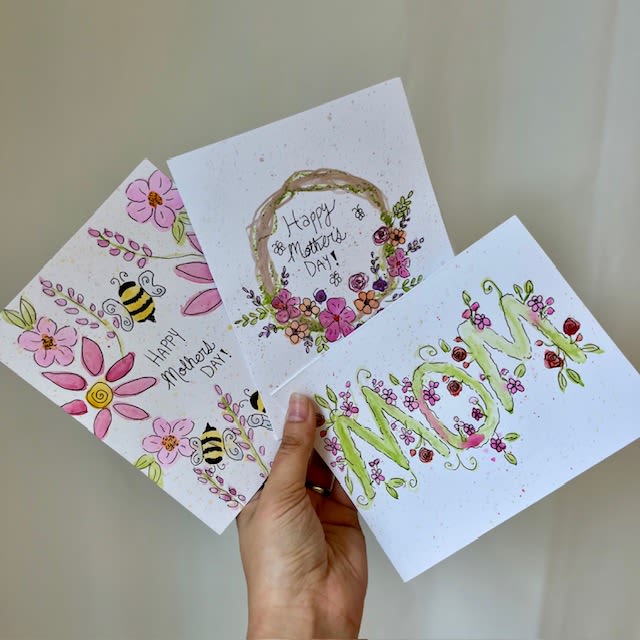 Handmade Mother's Day cards with floral and bee illustrations