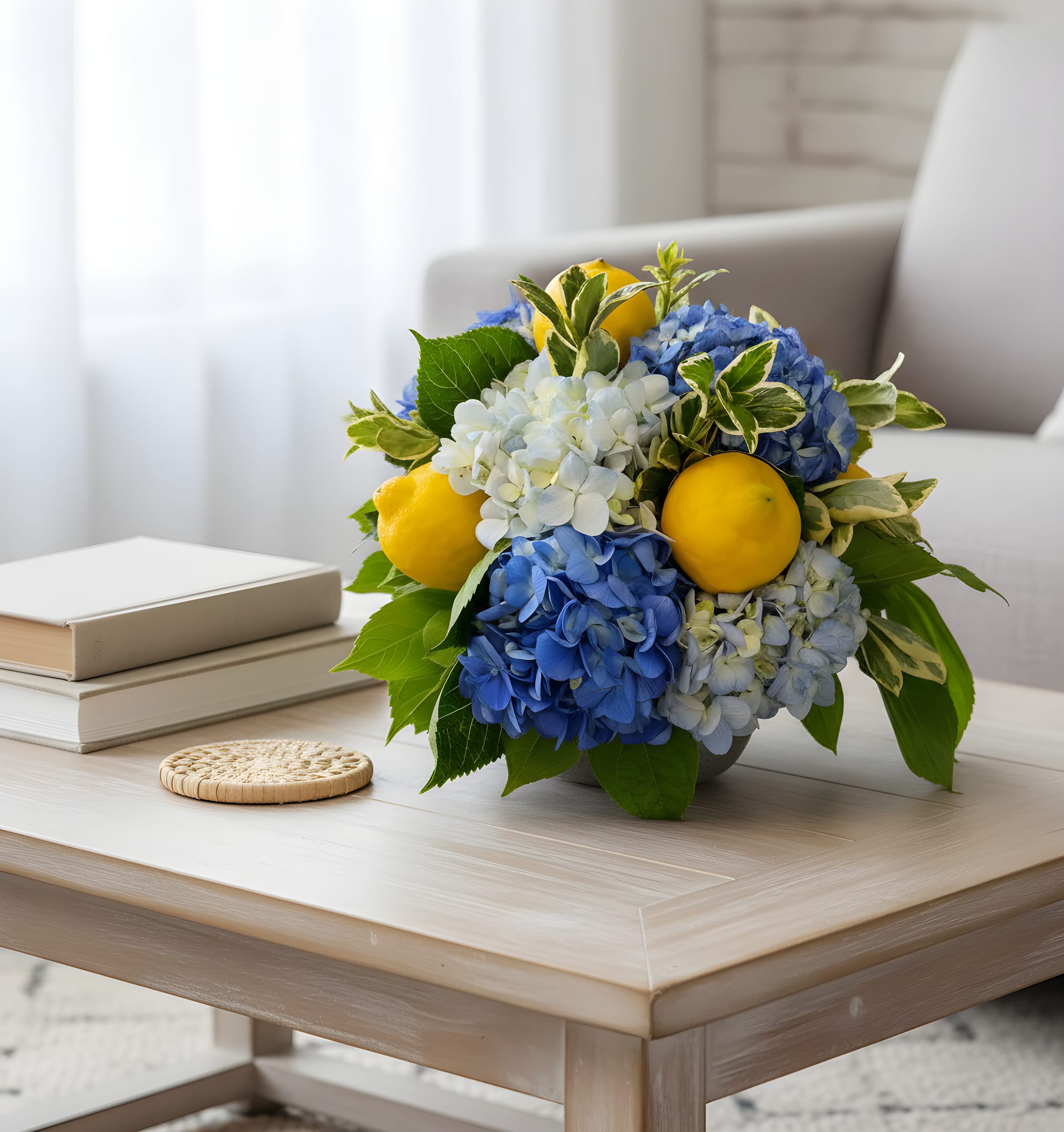 Amalfi Blue Garden - This Amalfi and Tuscan inspired arrangement in bold blues with some vibrant lemons to give the feel of the Italy in any location of the home.