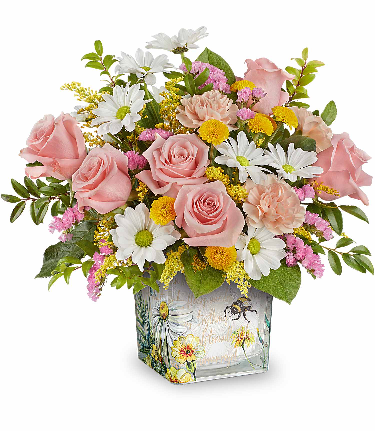Pink roses and daisies arranged in a square glass vase